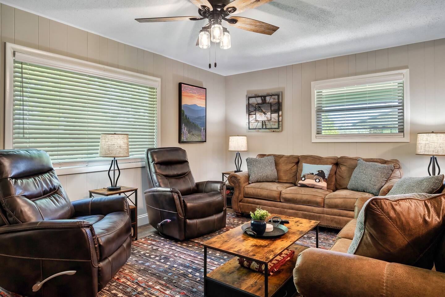 Relax in our spacious Smoky Mountain living room. Comfy leather seating, including a queen sleeper sofa, ensures restful nights for the whole family. Minutes from Pigeon Forge attractions.