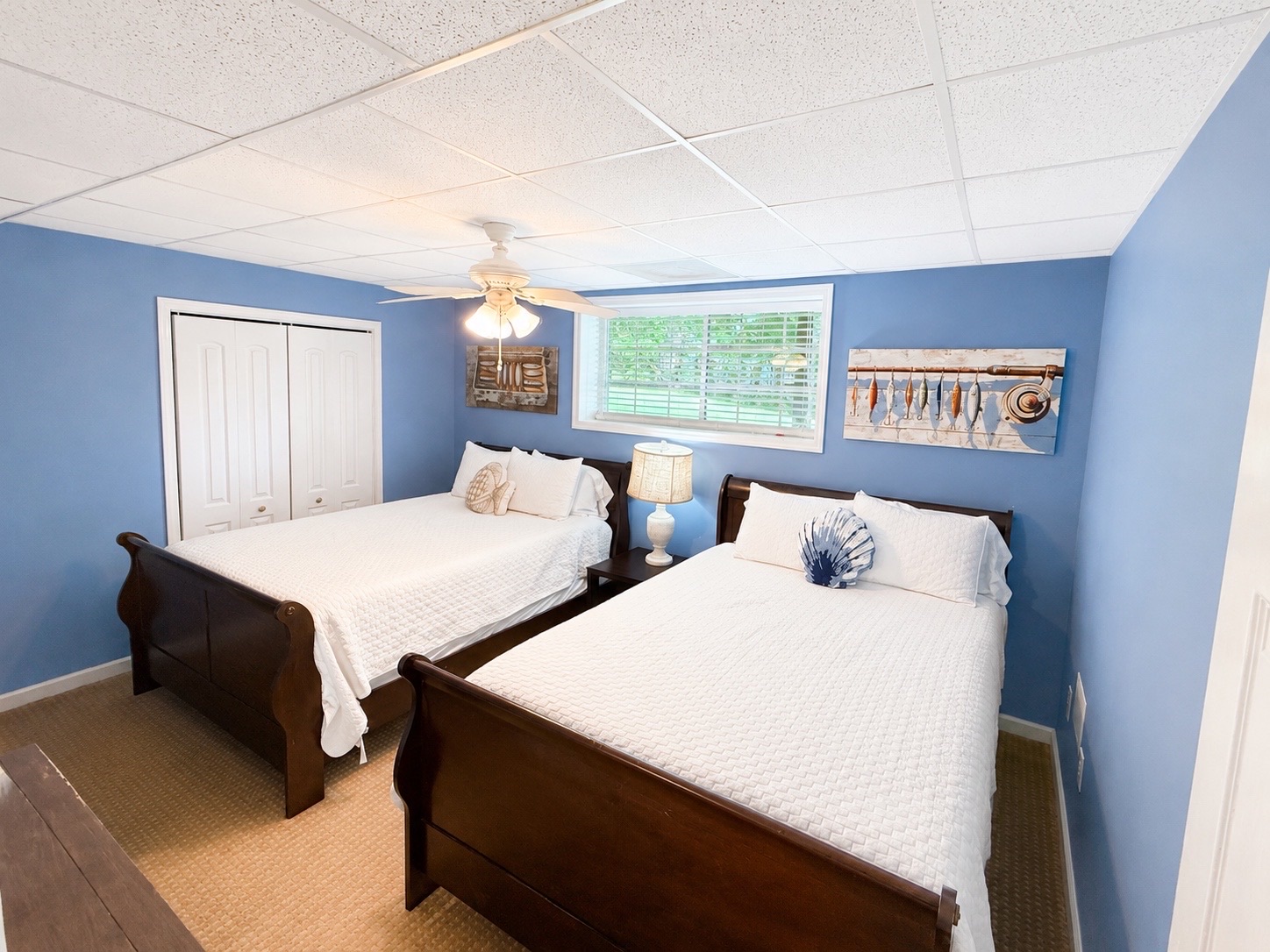 Spacious basement bedroom with comfortable bedding