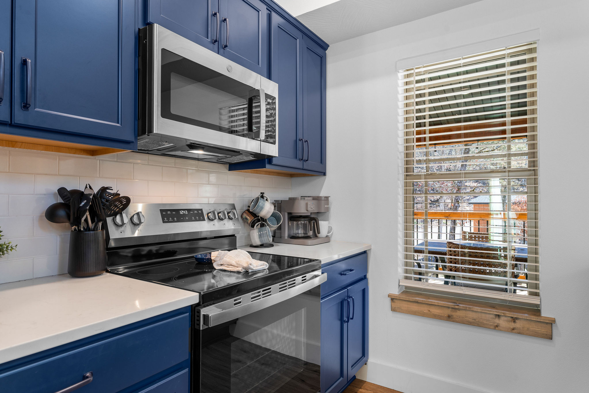 Well-appointed kitchen workspace ready for home-cooked meals.