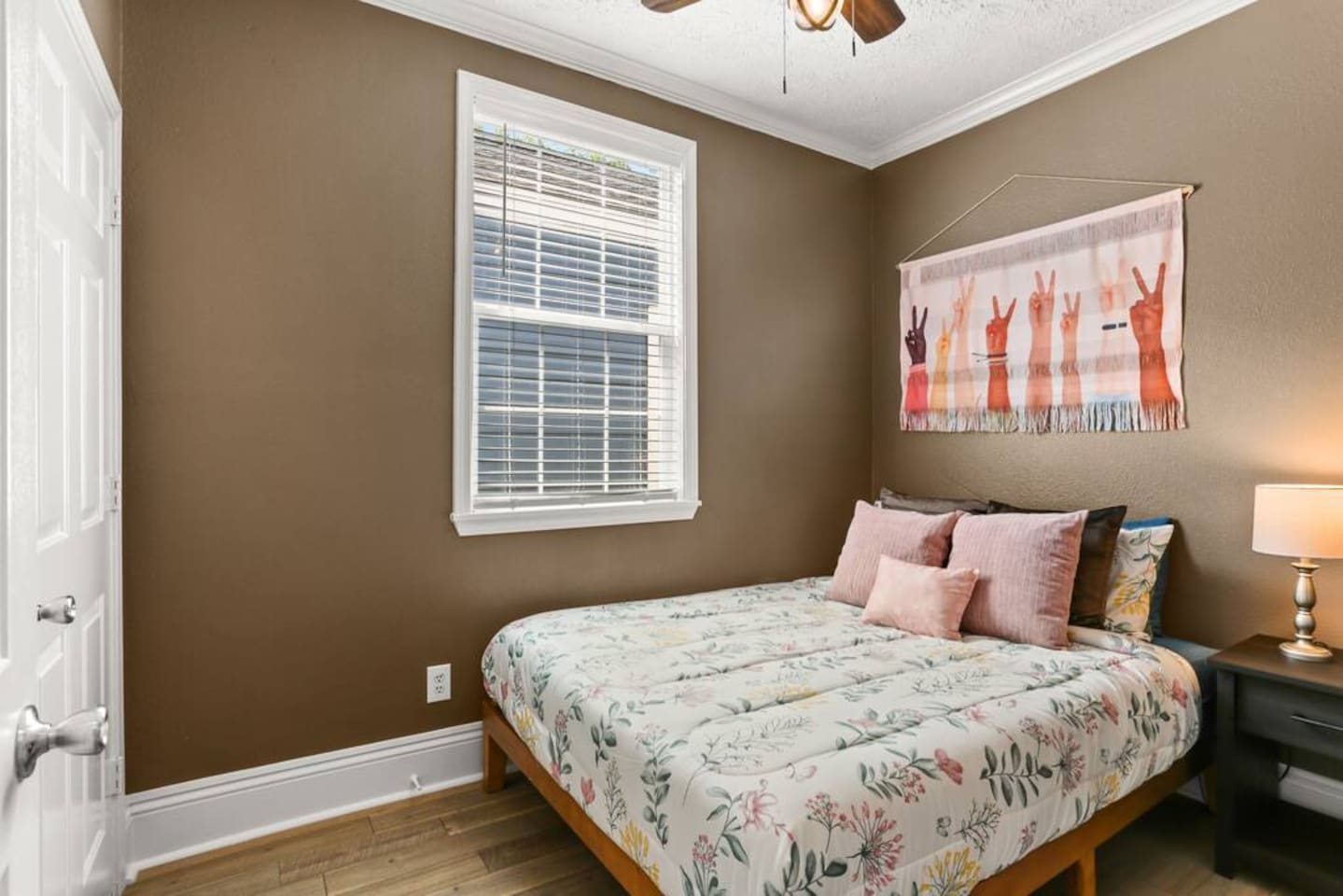 The "Brown" bedroom has a comfy queen bed, closet, plenty of pillows, and everything for a restful stay