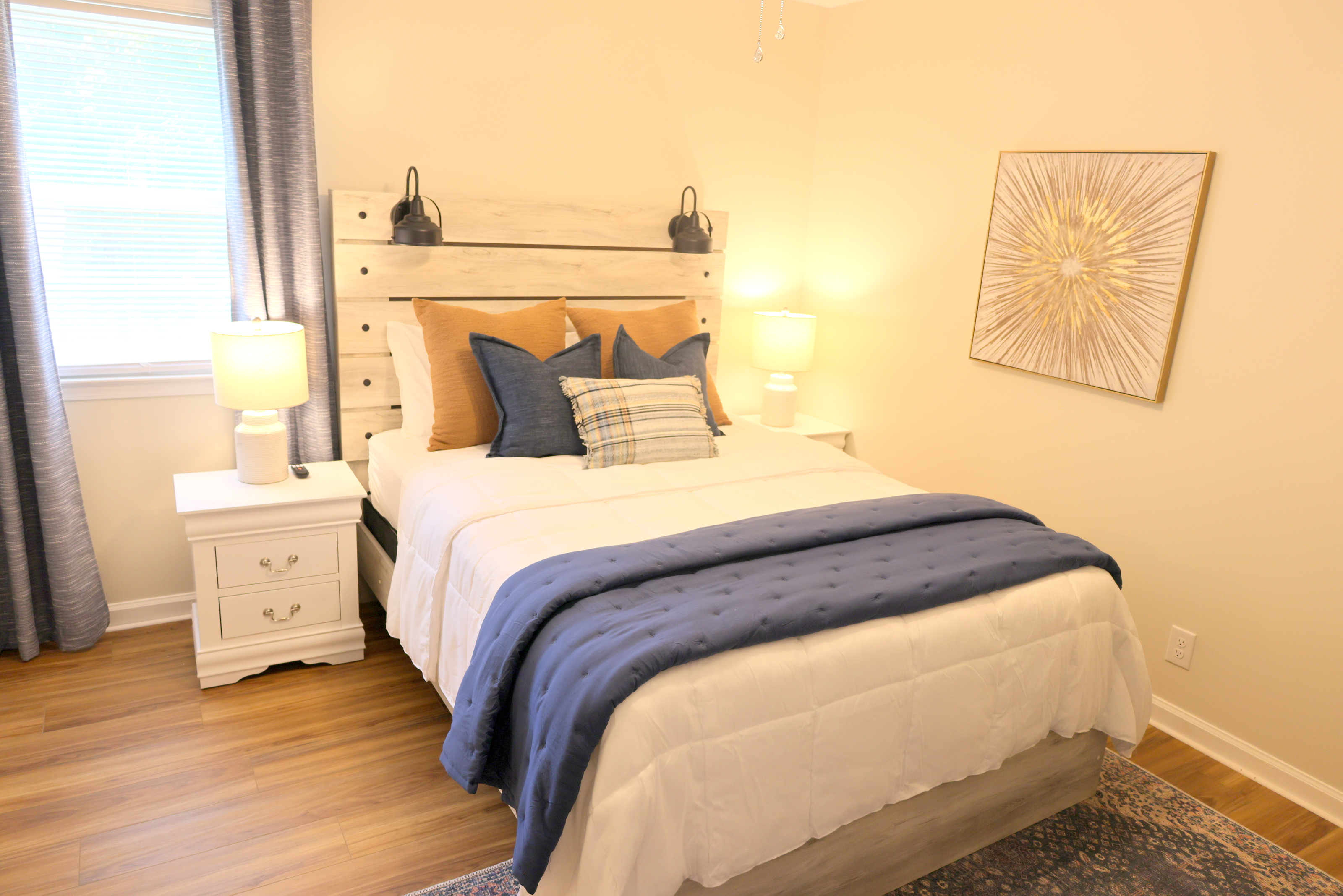 Comfortable bedroom with stylish décor and cozy bedding