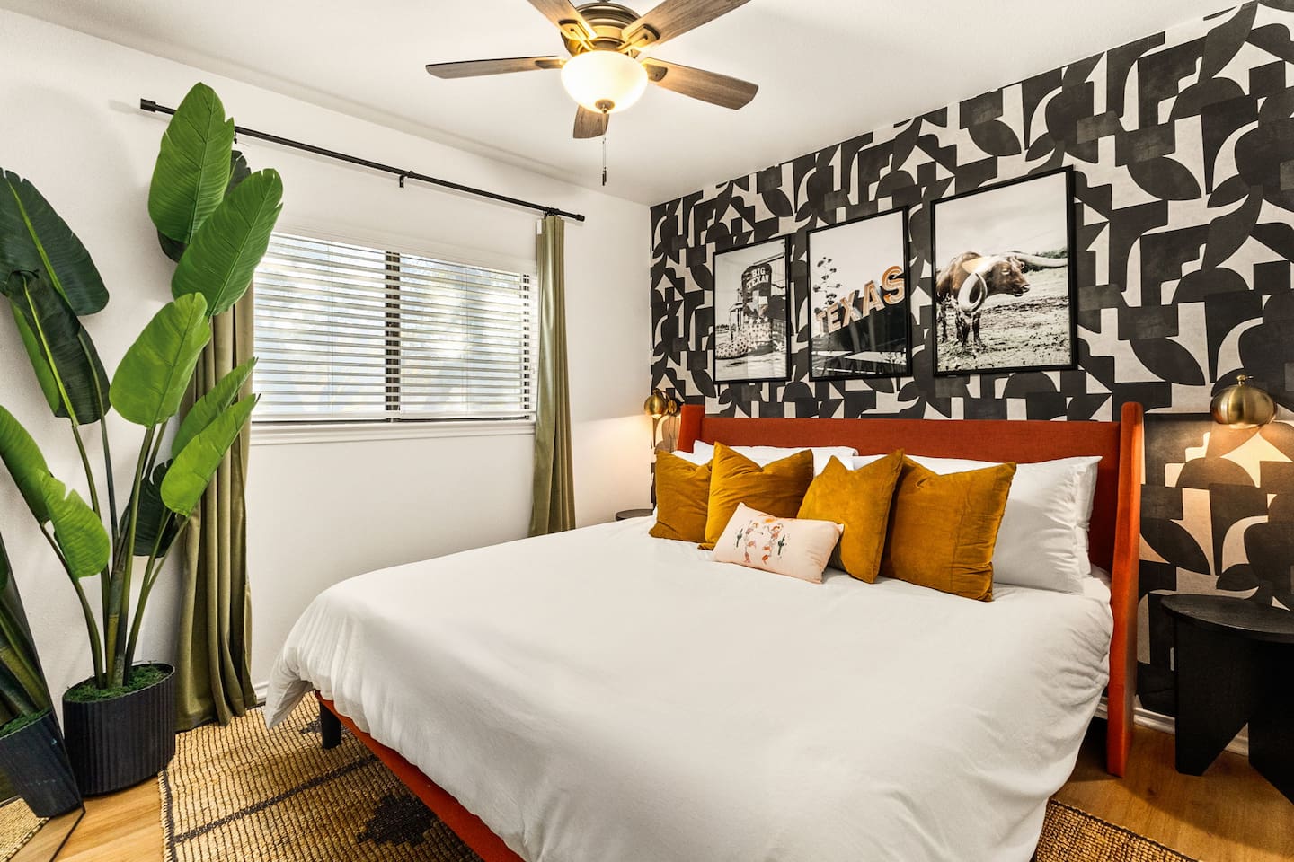  Bold Texas flair meets cozy comfort in this king bedroom. With warm tones, playful art, and a modern twist, it’s perfect for couples or solo travelers wanting both personality and peace after a full day out.