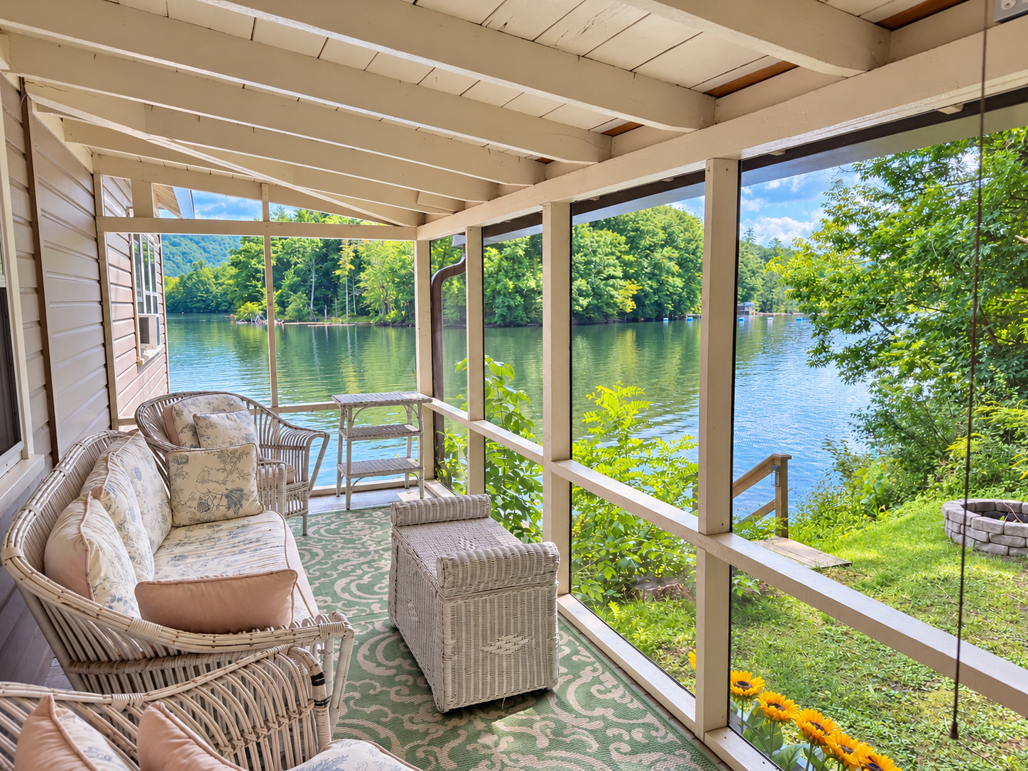 Goodyear Boathouse screened in porch overlooking the water.