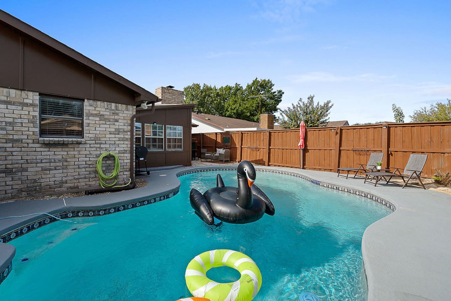 Take a dip in the refreshing pool in your private, fully-fenced backyard