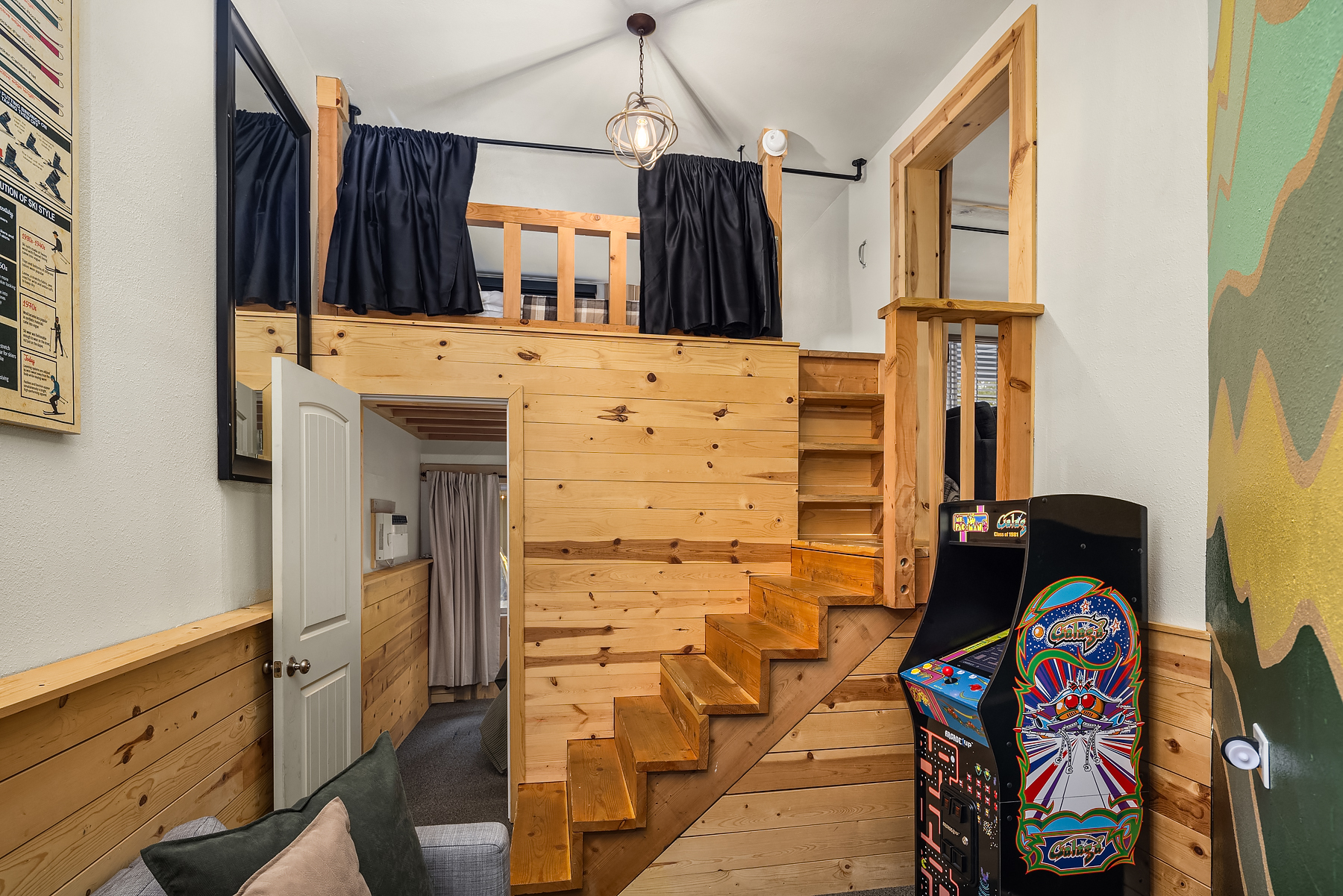 Stairs leading to the basement sitting area and to the 2nd bedroom