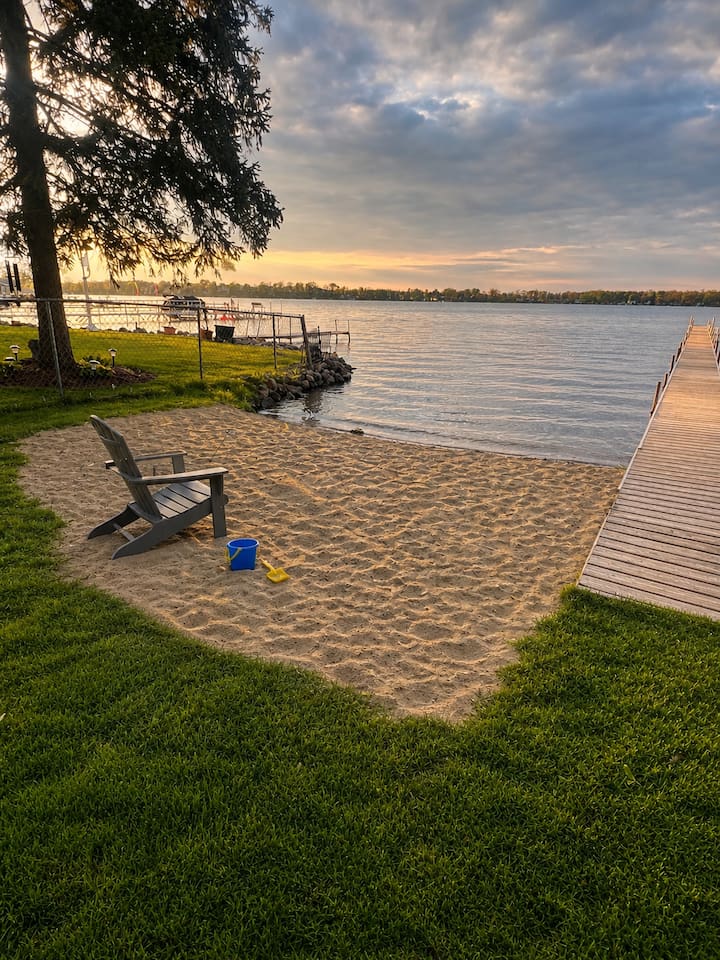 Beach area, boats will be on dock; This is a spring time photo. This area is shared with the few houses on the street. Dock is private and cannot be used. 