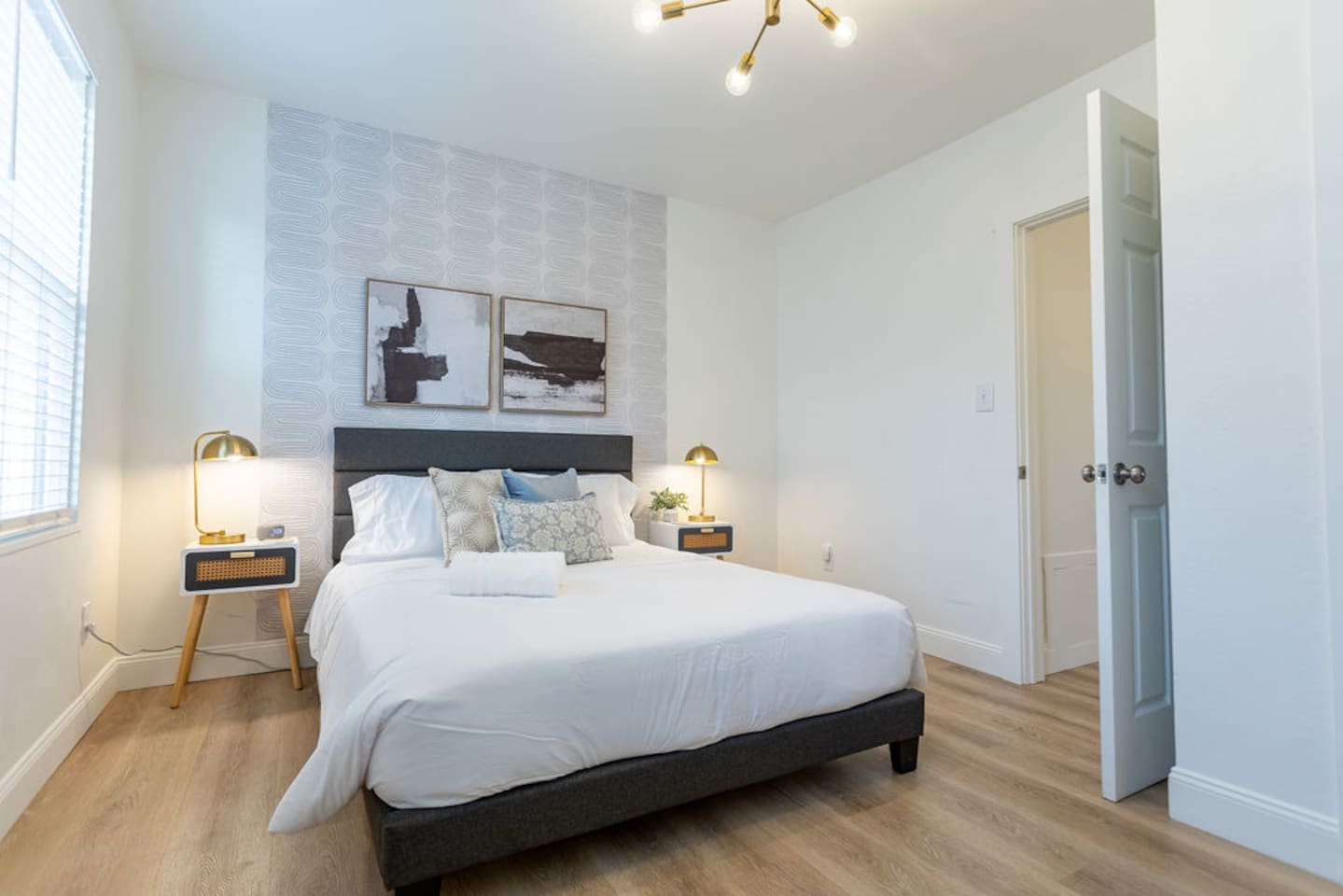Bright and spacious queen-sized bedroom, offering a comfortable retreat for restful nights.