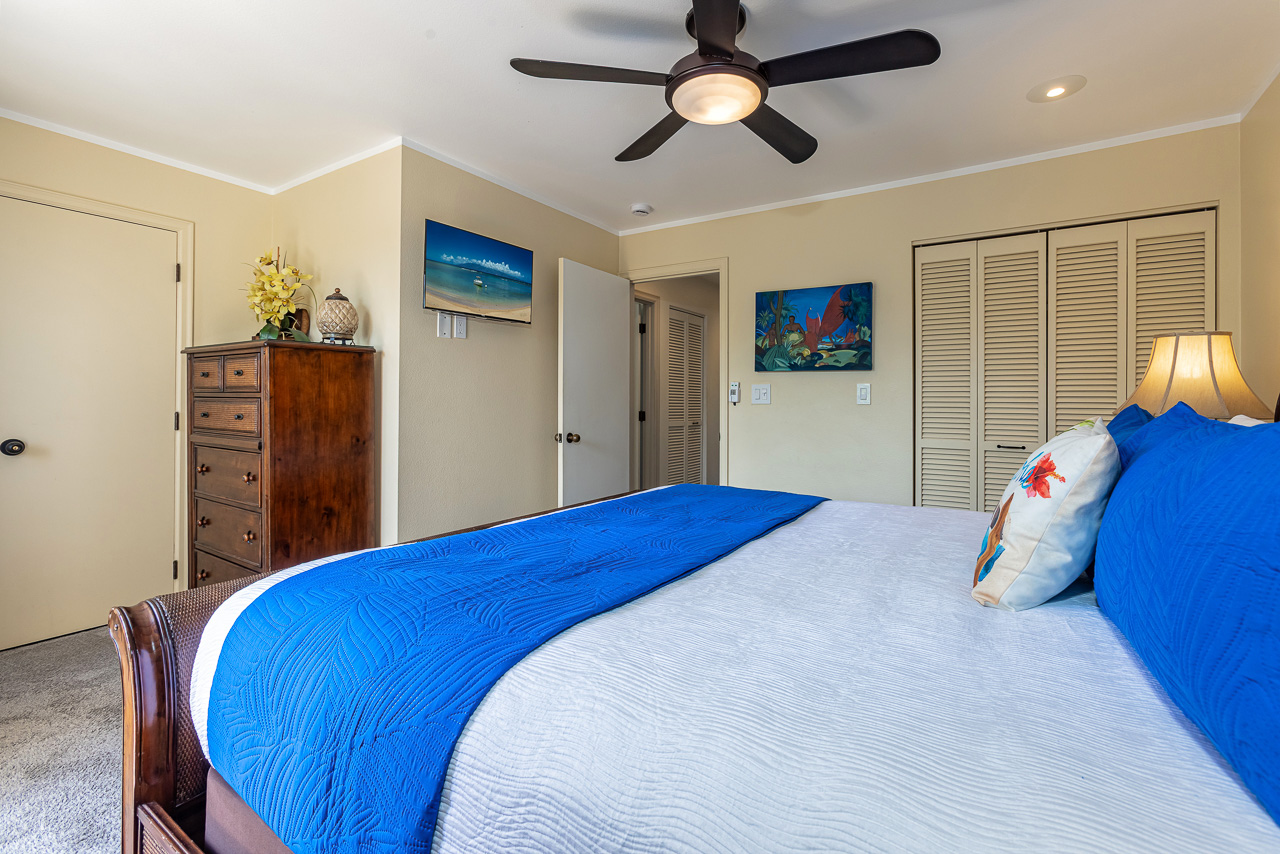 Guest bedroom has SMART TV, dresser, AC and balcony