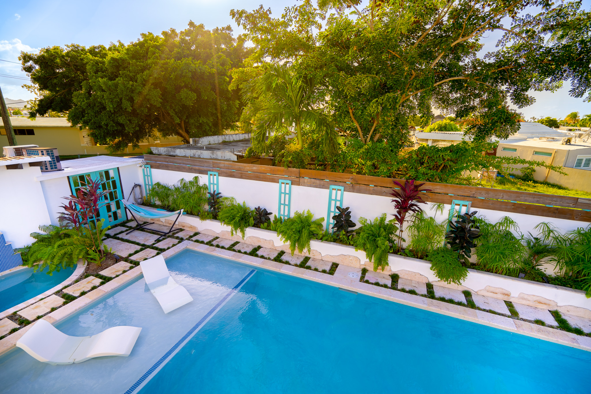 You belong in the chaise lounges relaxing by the pool in Dorado, Puerto Rico.