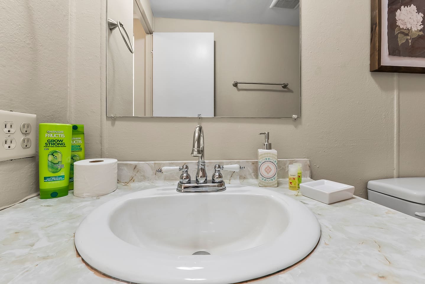 Compact design with modern fixtures, soft lighting, and thoughtful decorative touches.