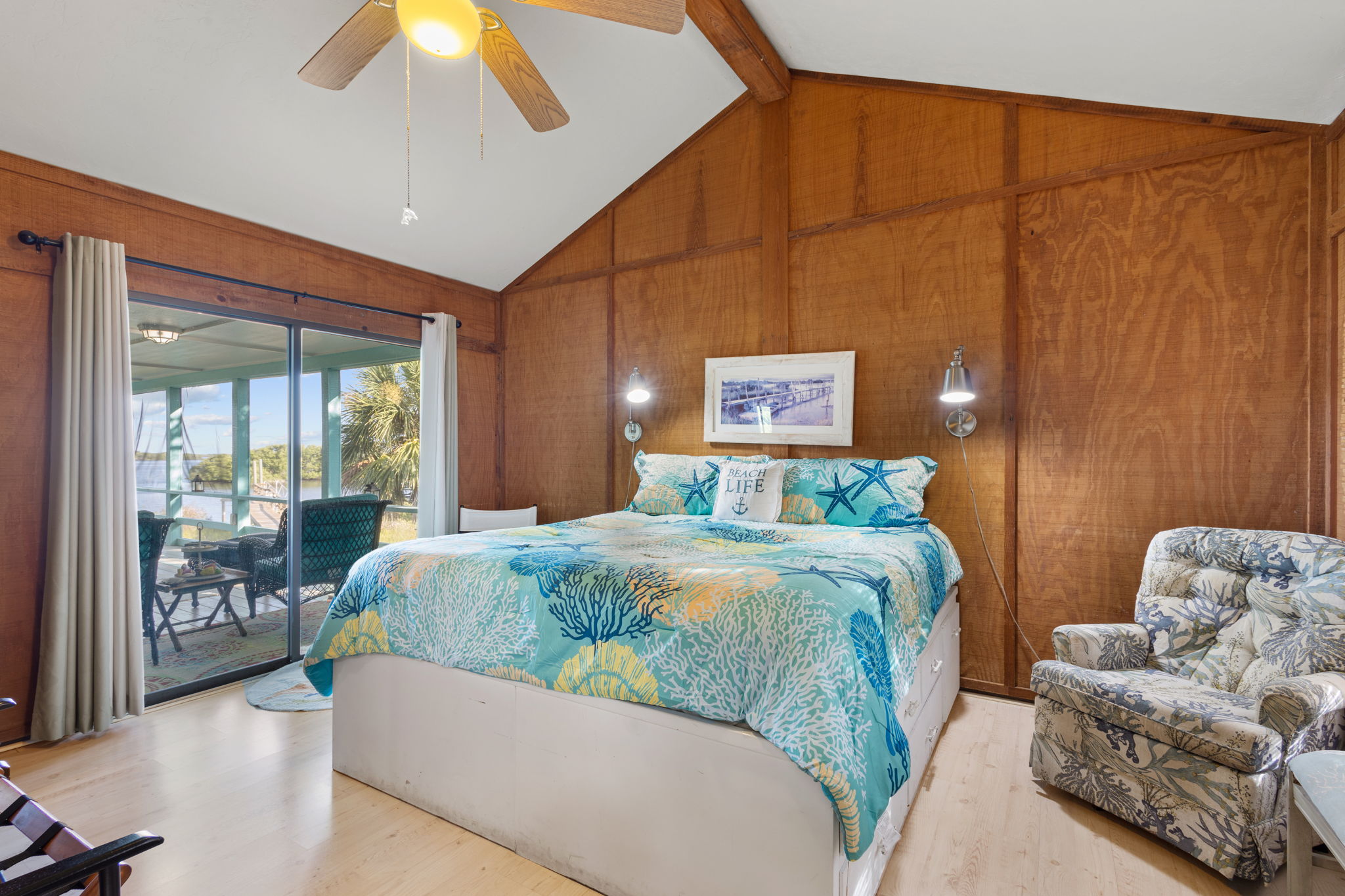 Gorgeous master bedroom with doors to porch for awesome views!