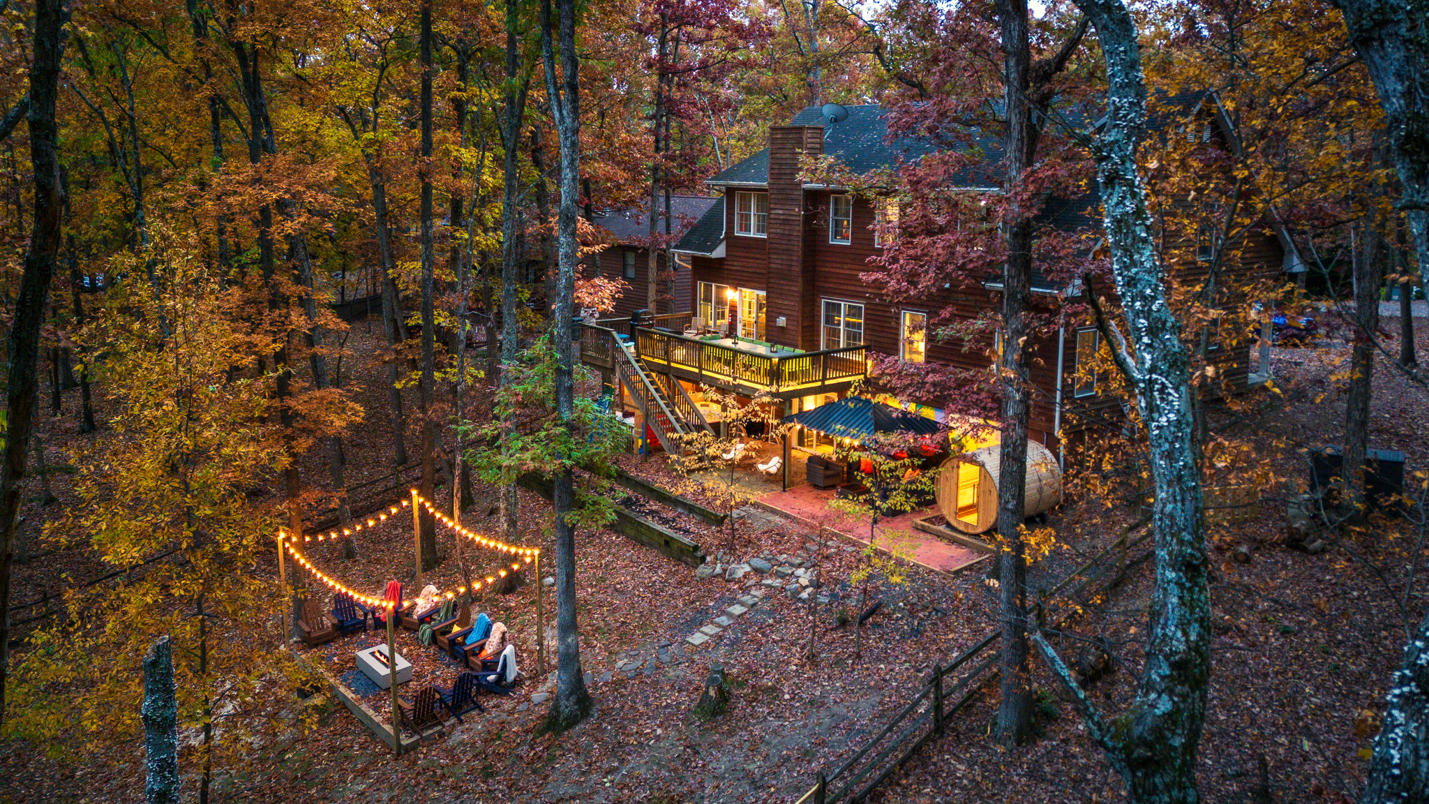 Where the memories happen — firepit nights, glowing lights, and the perfect mountain backdrop