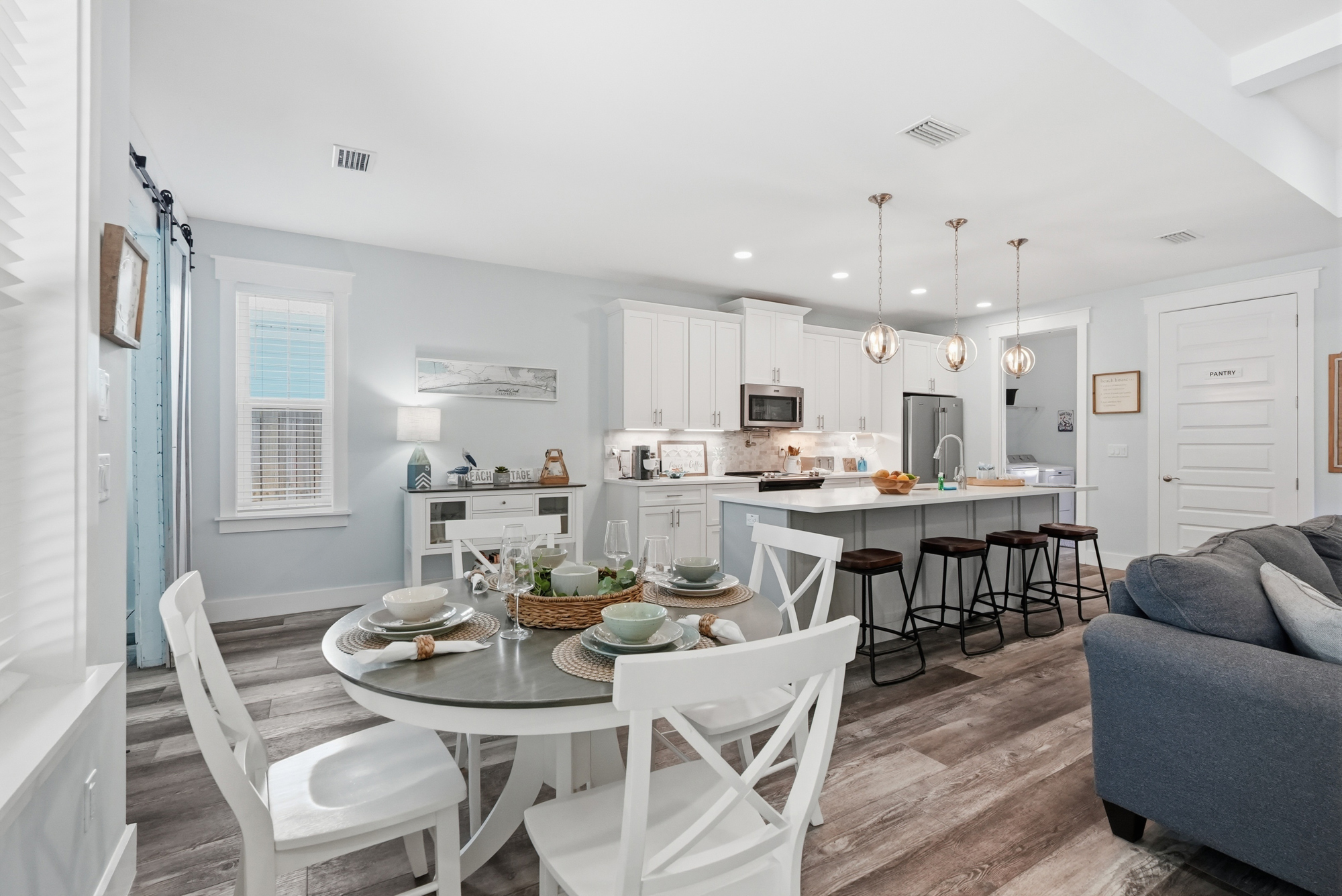 Dine in at the dining table or island with enough seating for 8, and a well-stocked kitchen for all guests.