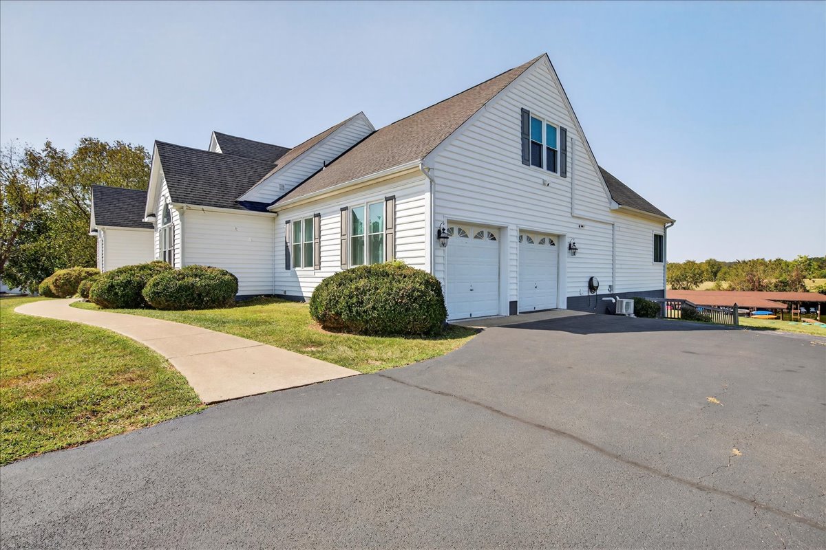 Ample parking in the driveway with easy access to the lake.