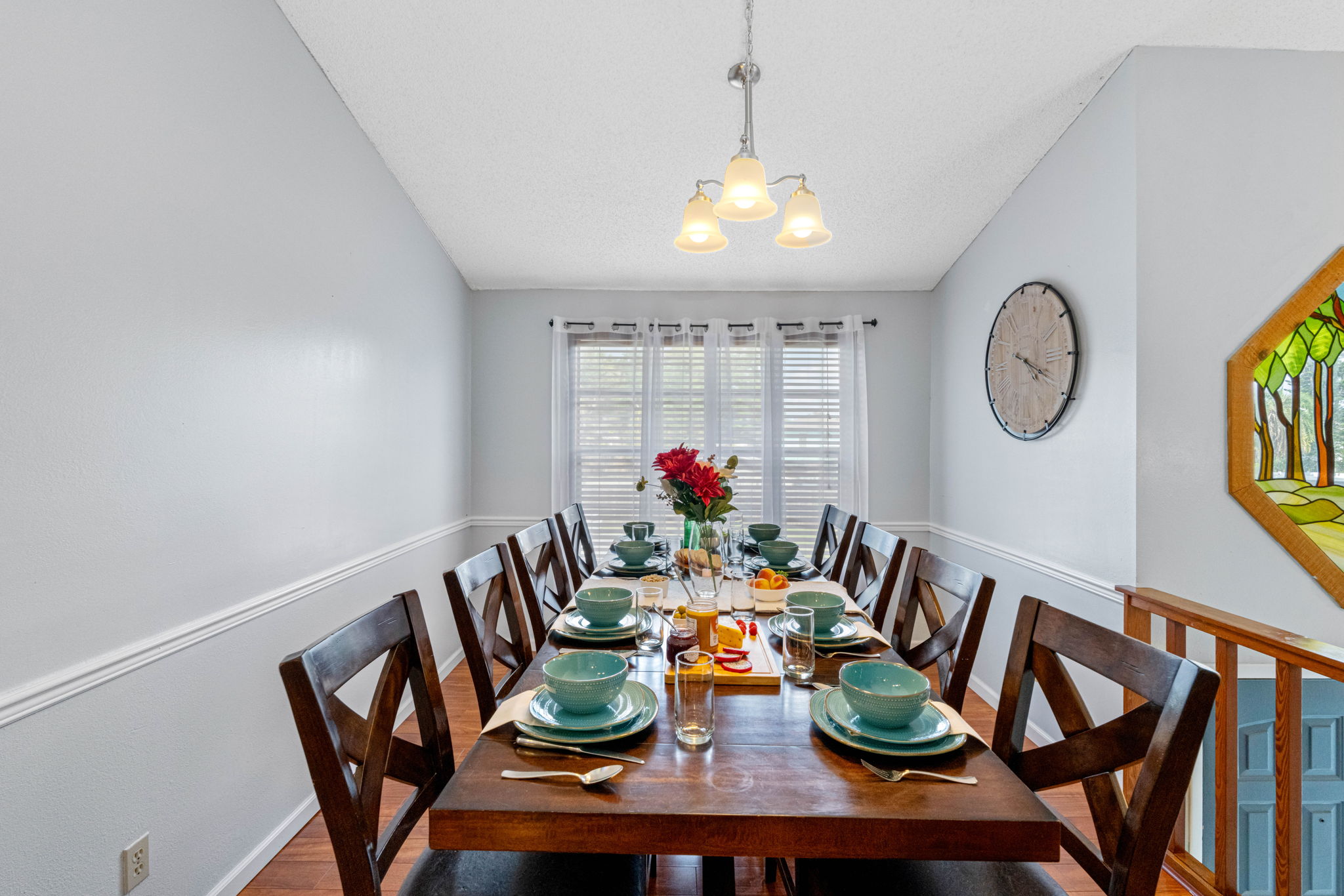 Set against a backdrop of warm wood floors and soft neutral tones, this space seamlessly blends rustic character with modern elegance.