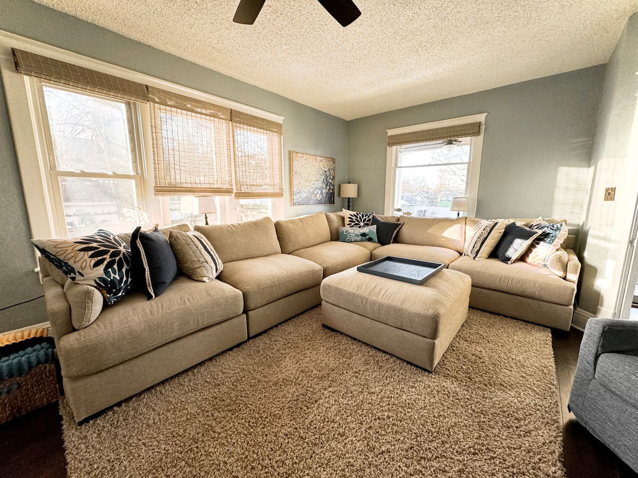Huge, oversized sectional provides comfortable seating in the Main Level Living Room.