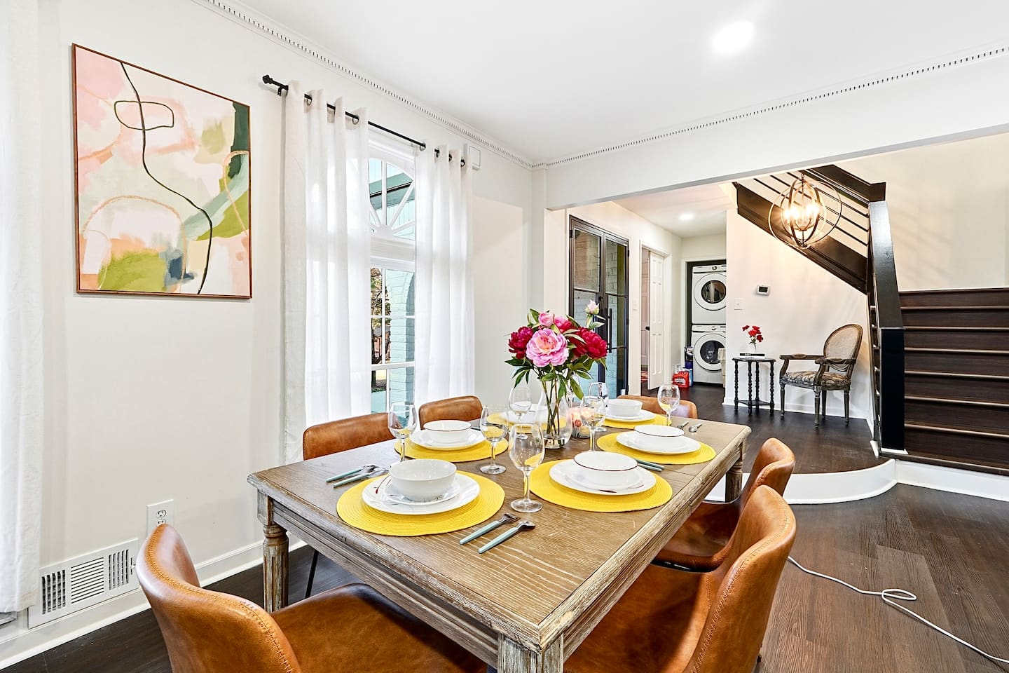 Charming wooden dining area comfortably seating up to 6 guests. Perfect for sharing meals, laughs, and creating lasting memories.