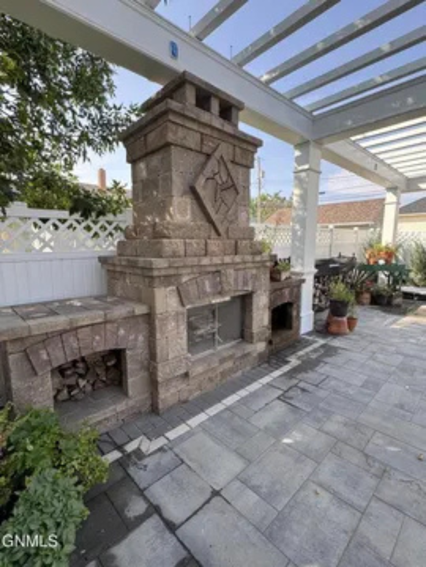 This outdoor fireplace gives you another great spot to unwind with your group.