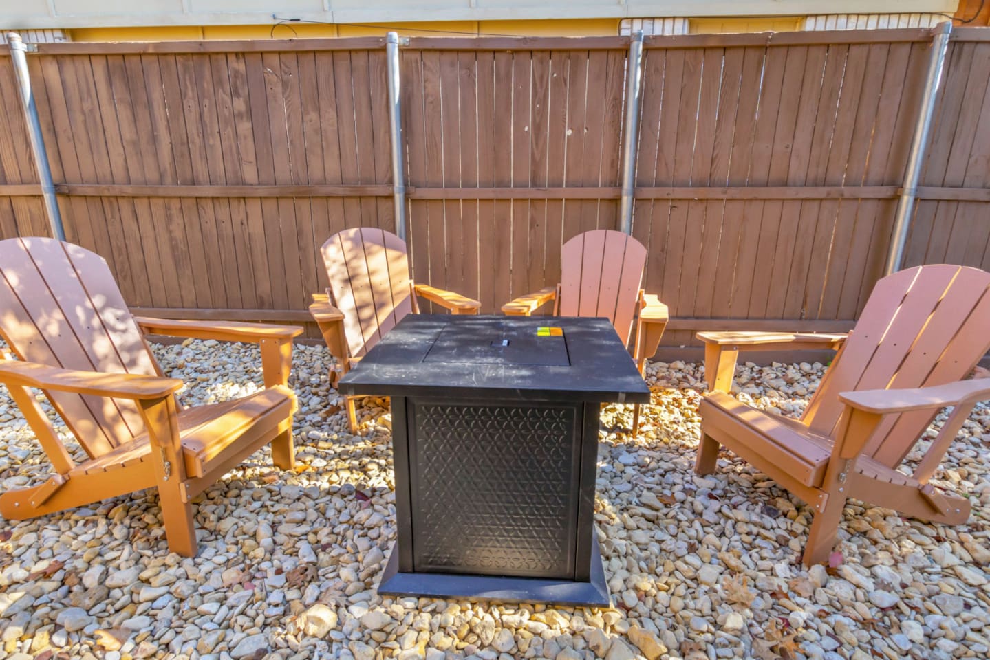 Gather around the firepit for s’mores, conversations, and outdoor evenings under the Texas sky. Comfortable seating for three makes this the go-to hangout space for your group.
