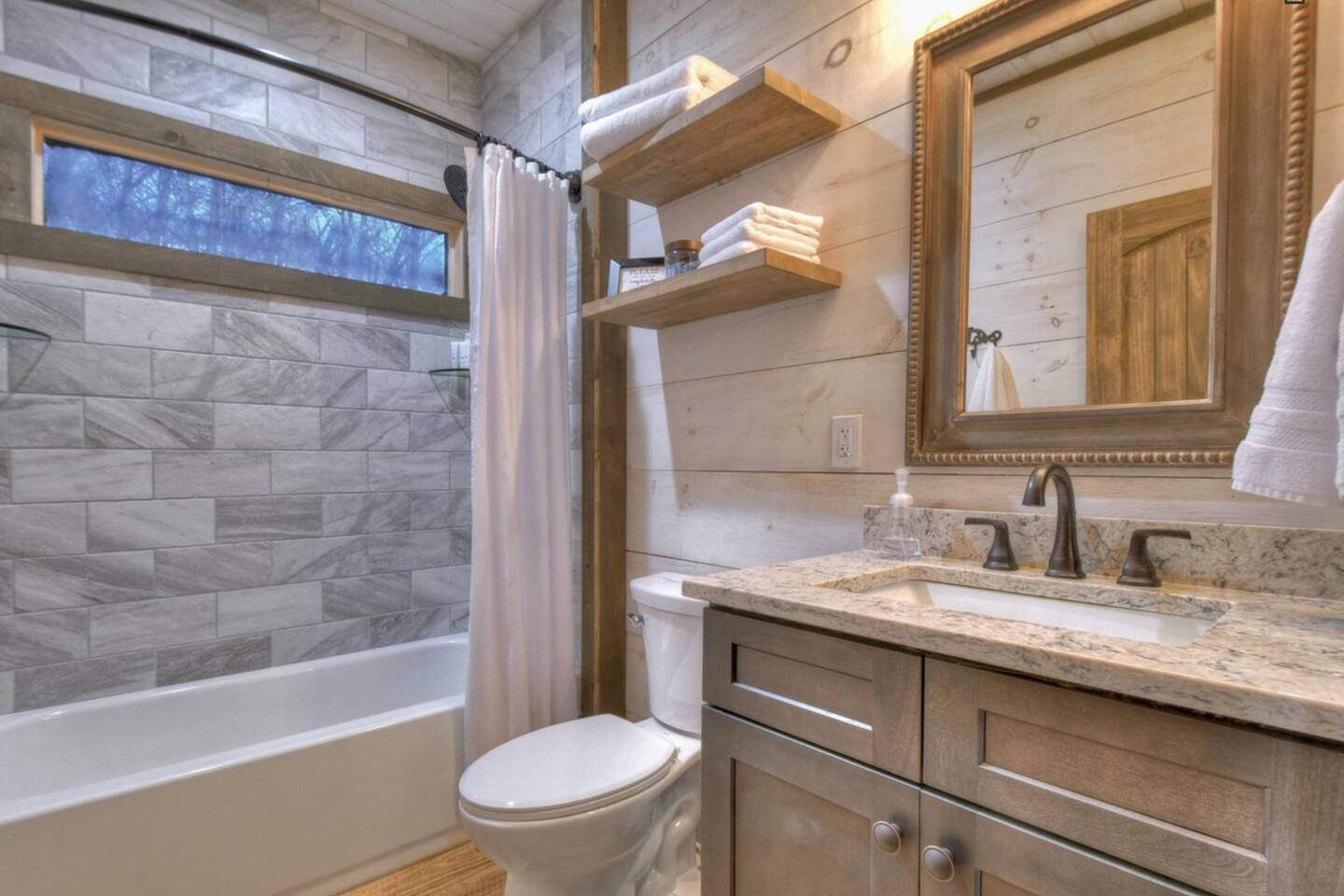 Main floor bathroom, shared between two bedrooms.