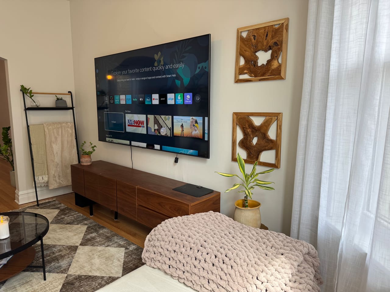 Living room entertainment area with comfortable seating.