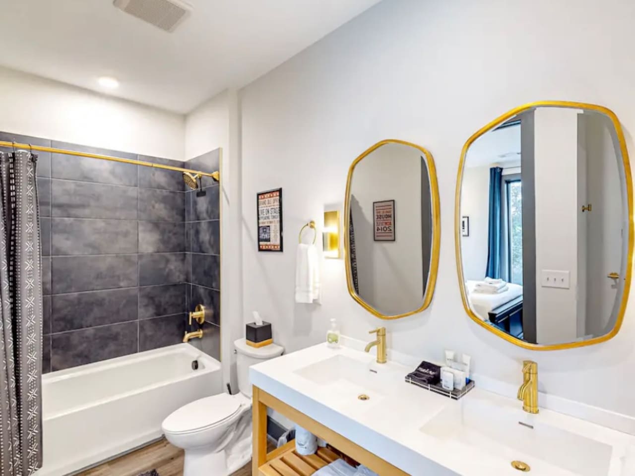 Bathroom Retreat: Elegant dual vanities and modern fixtures invite relaxation in style!