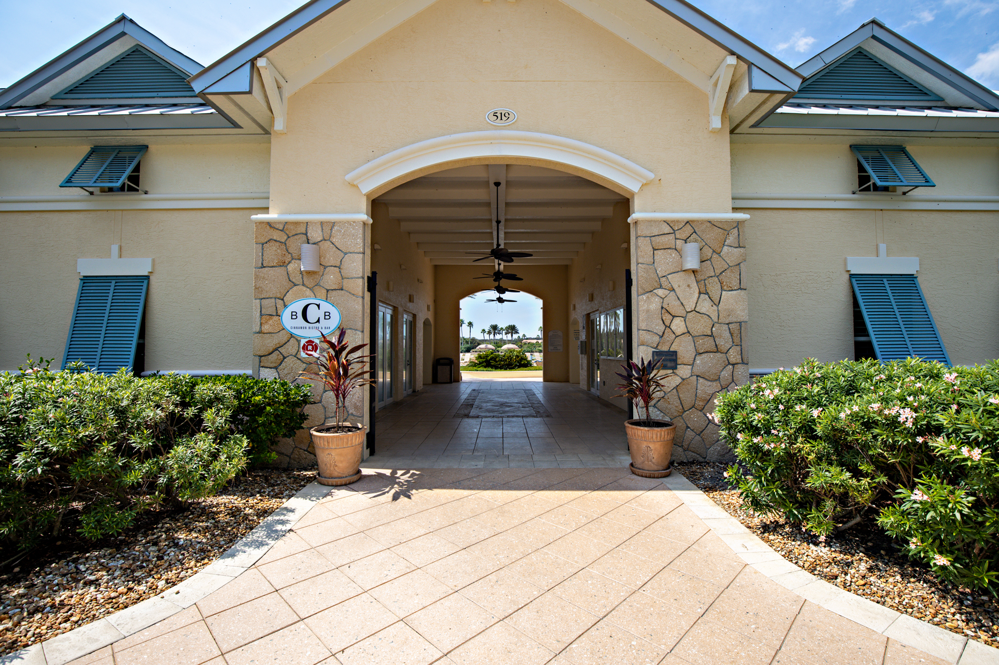 Your grand entrance to Cinnamon Beach — step through the breezeway and you’re moments from the pools, palm trees, and ocean air. 🌴🏖️
