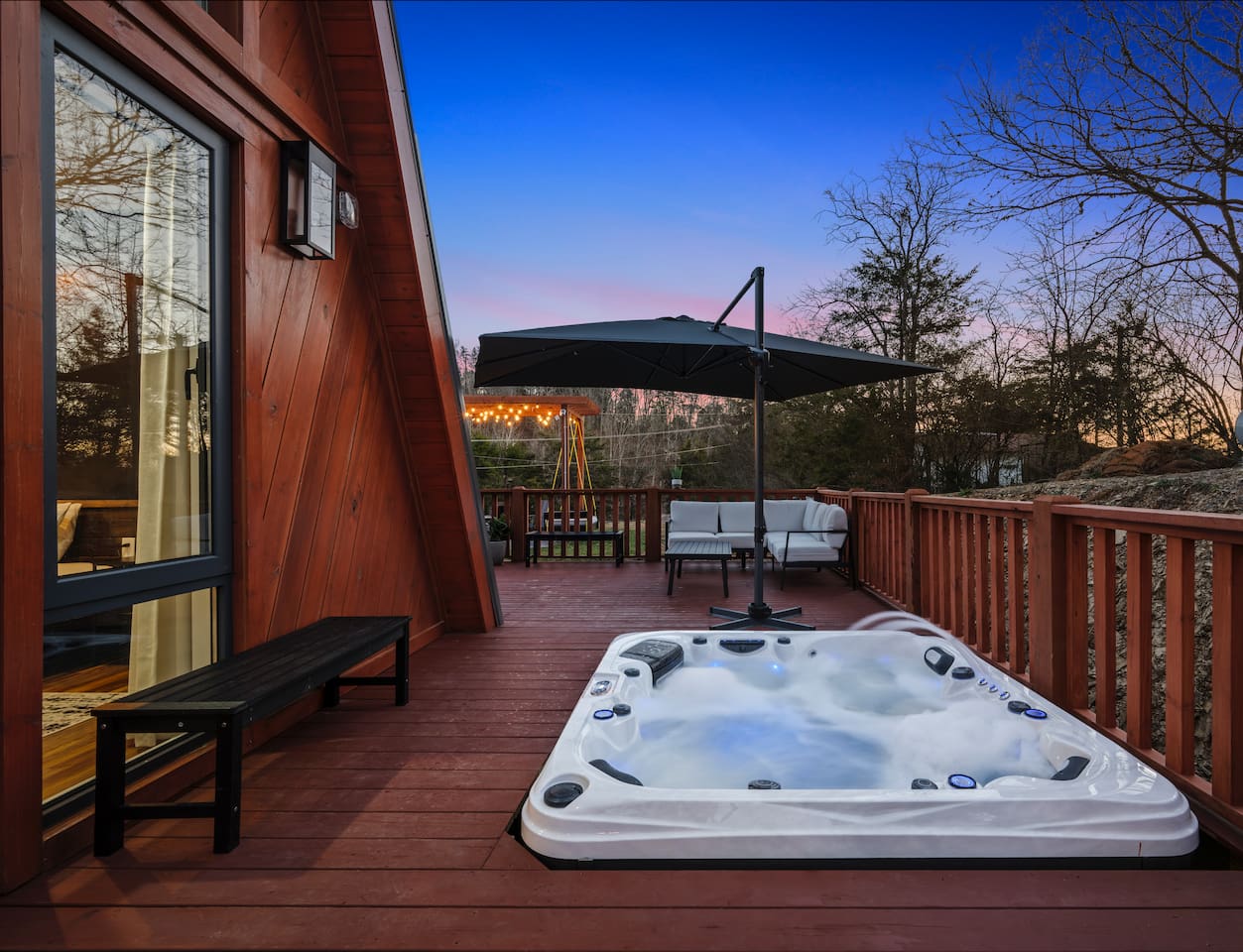 Soak under the stars in your private outdoor hot tub oasis.