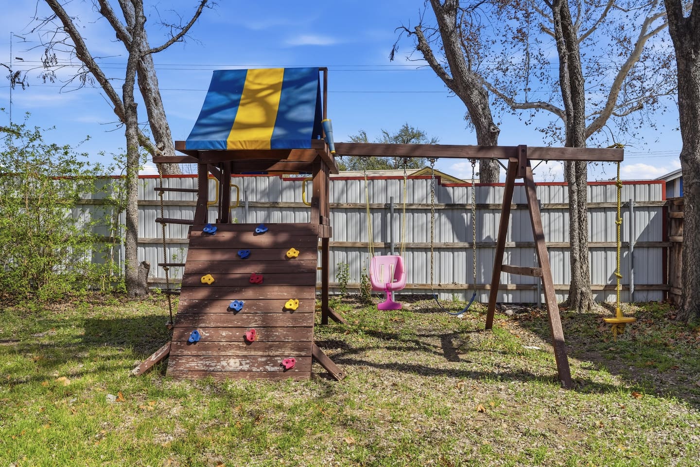 Fun backyard with kid-friendly games, perfect for outdoor play and family time.