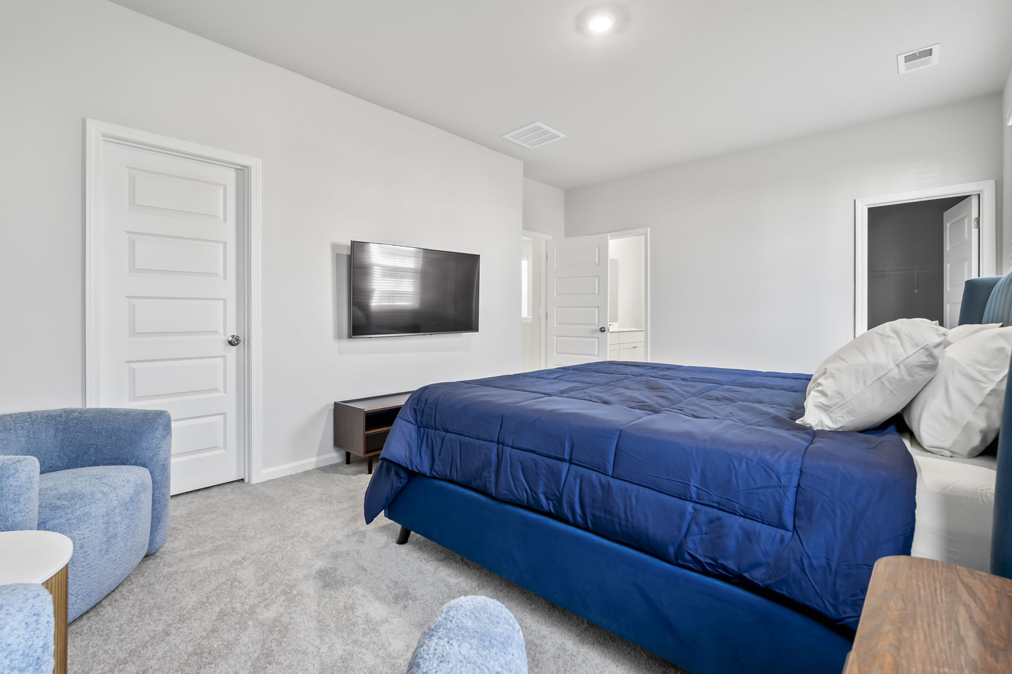 Master Bedroom with King bed, ensuite bathroom, walk in closet and Roku Smart TV