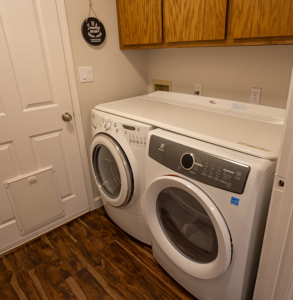 Laundry area with washer and dryer for added convenience during your stay.
