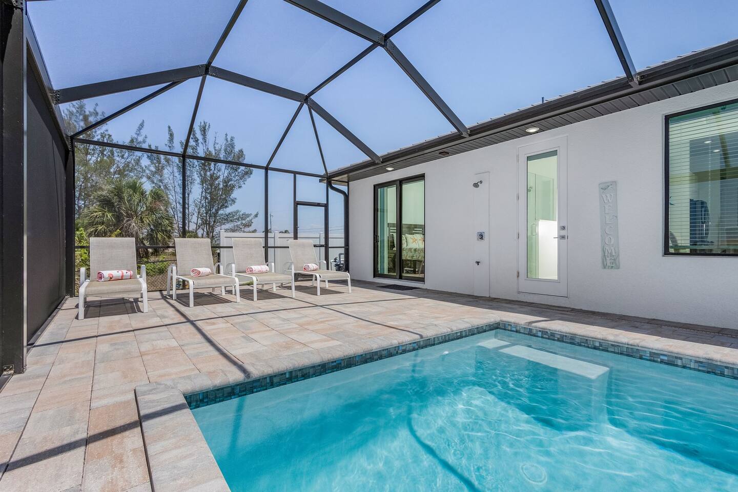 Relax and soak up the sun in the expansive lounging area, complete with a refreshing spa for the ultimate relaxation experience!