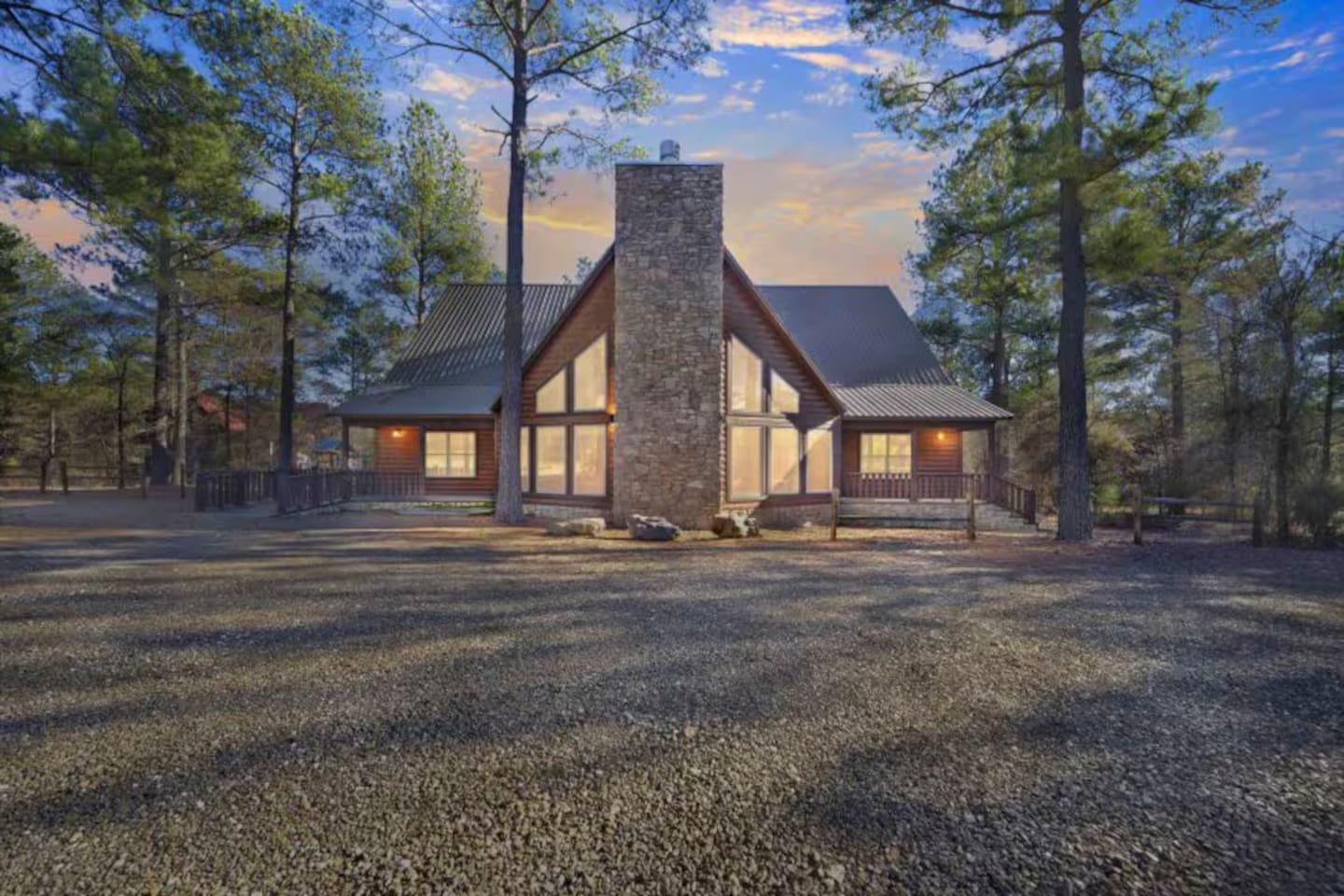 Golden‑hour glow on timber beams and treetops.
