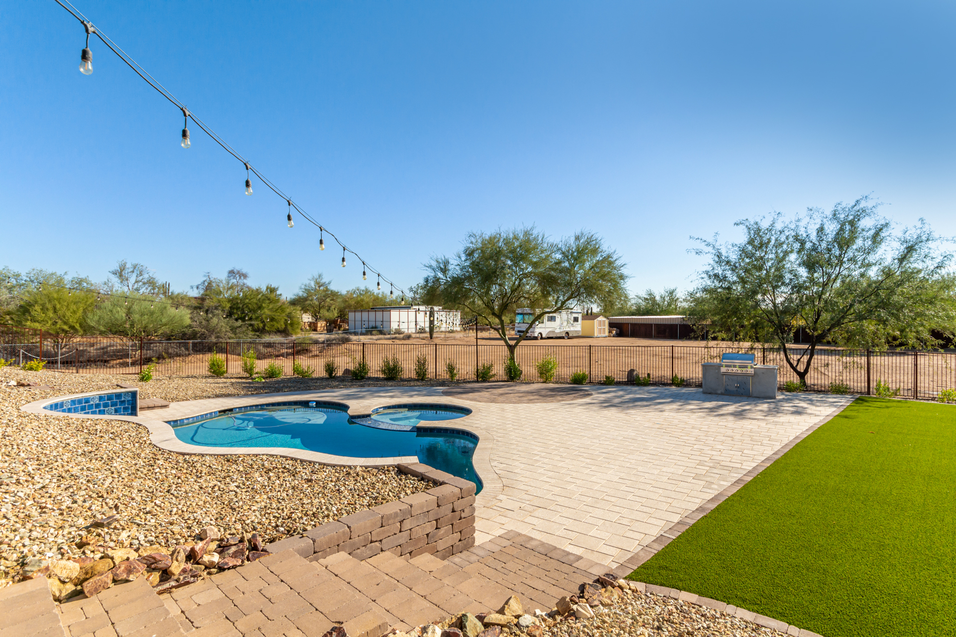 built in BBQ grill w/ propane provided