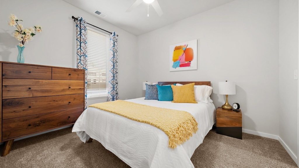 This bedroom is lovely with bright colors and new mid-century furniture. 