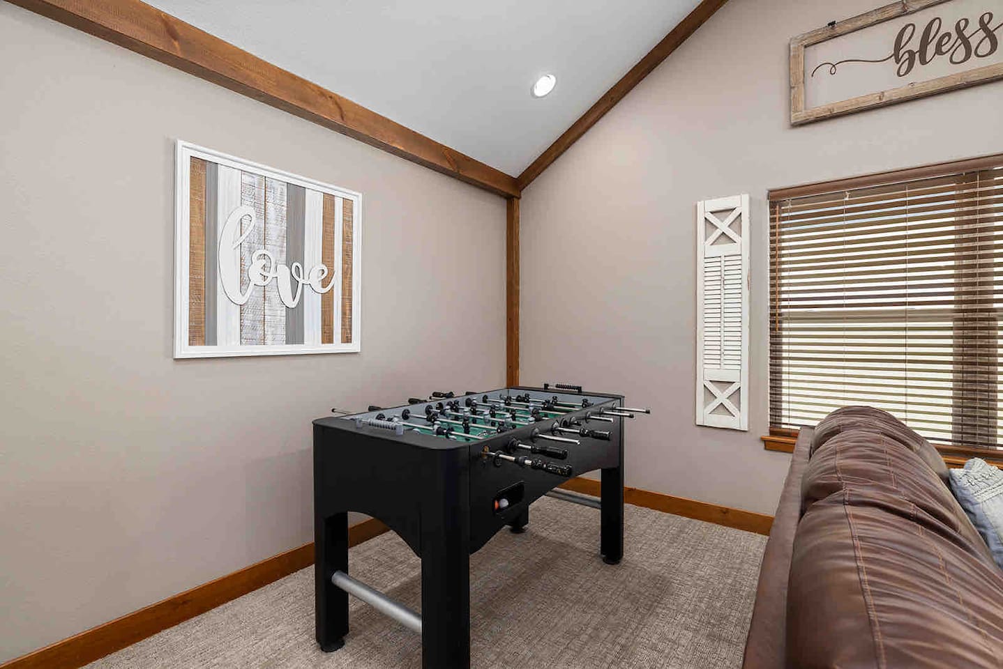 Upper level foosball table