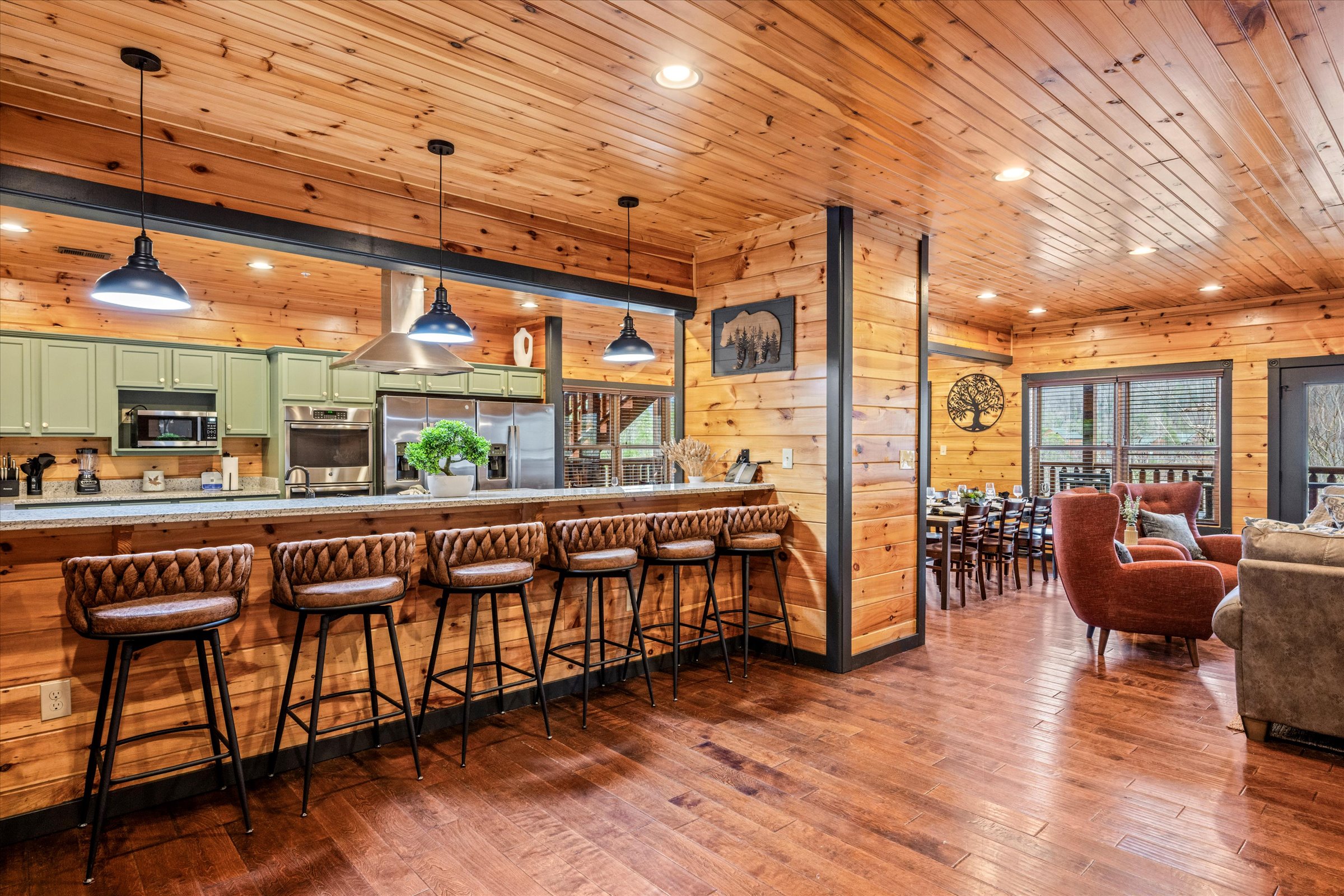 The kitchen has a bar for extra seating/dining.