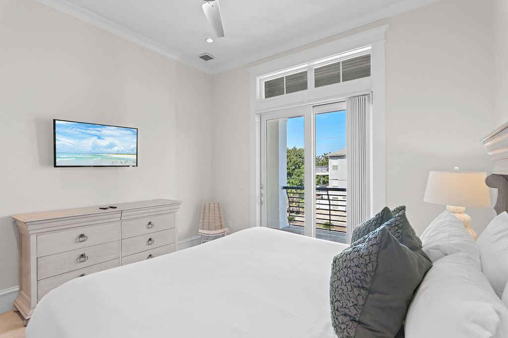 Bedroom 4 (Second Floor): King bed and twin-over-twin bunk bed with private bathroom