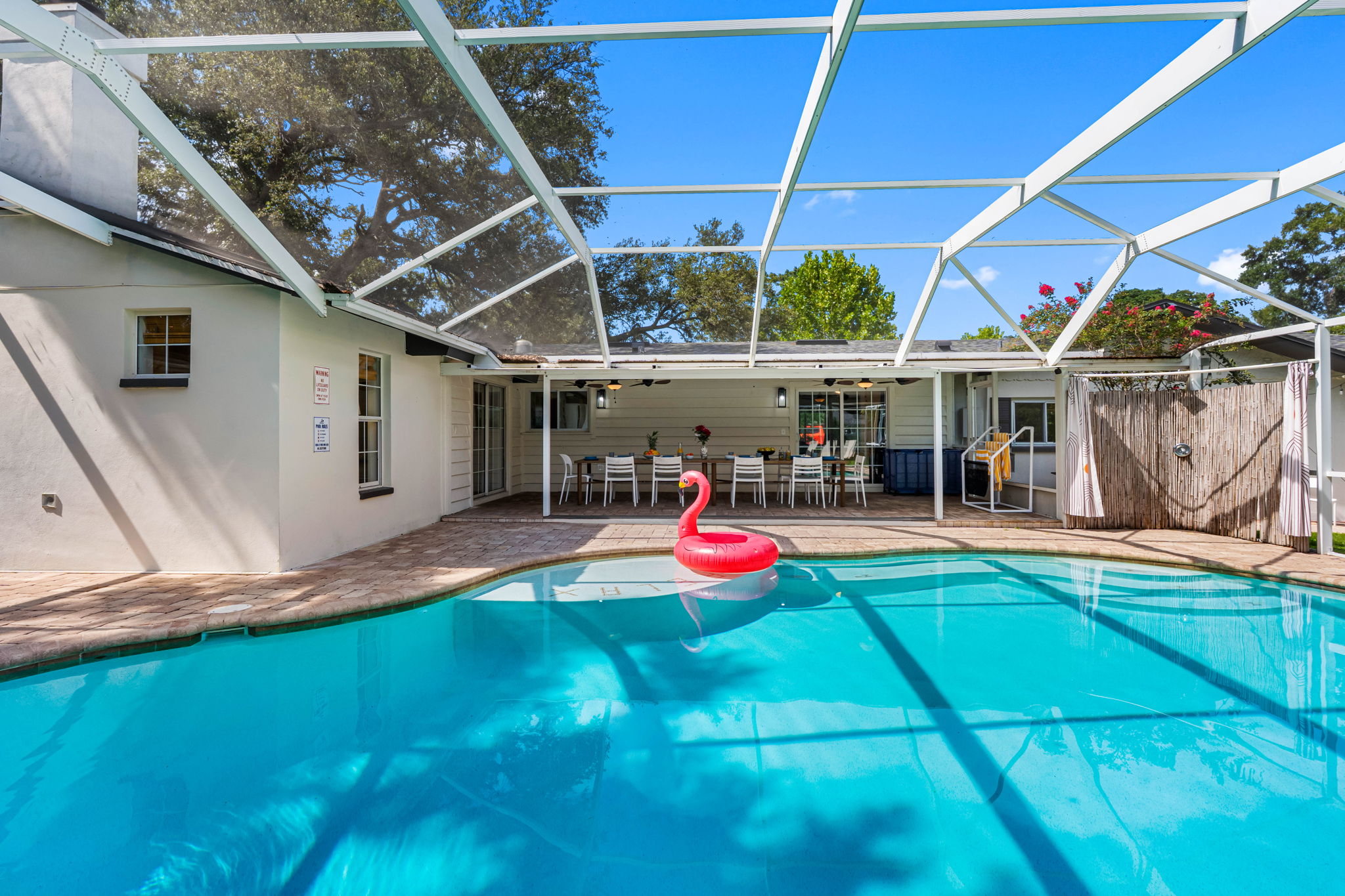 Large pool surrounded by greenery for a refreshing, private escape.