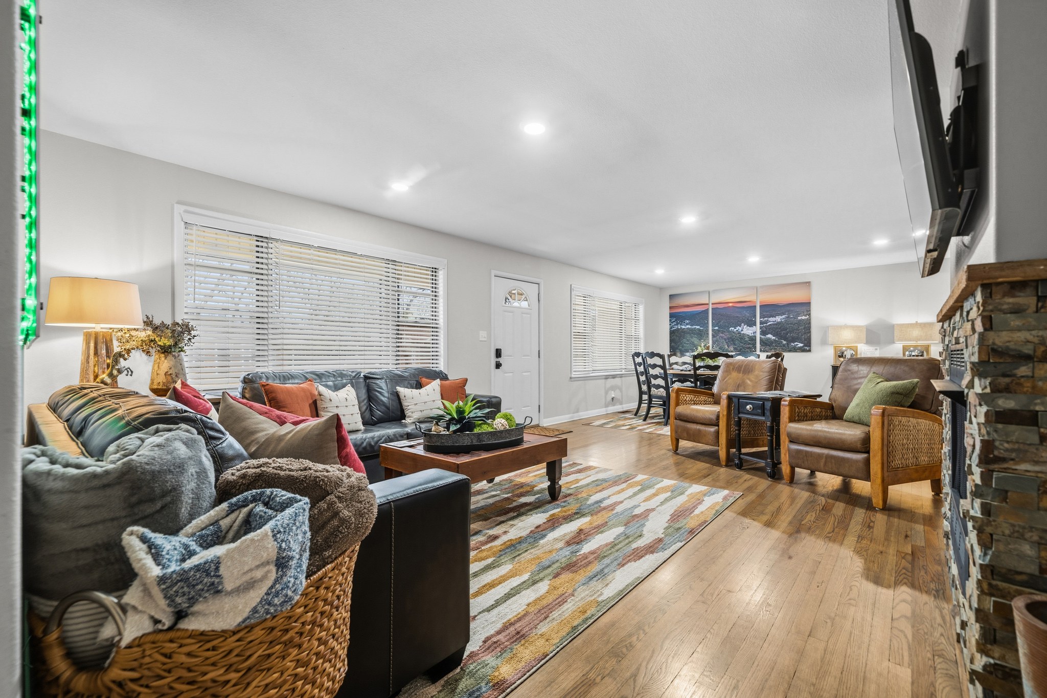 Move from the couch to the table without leaving the conversation — the main floor flows all the way through.