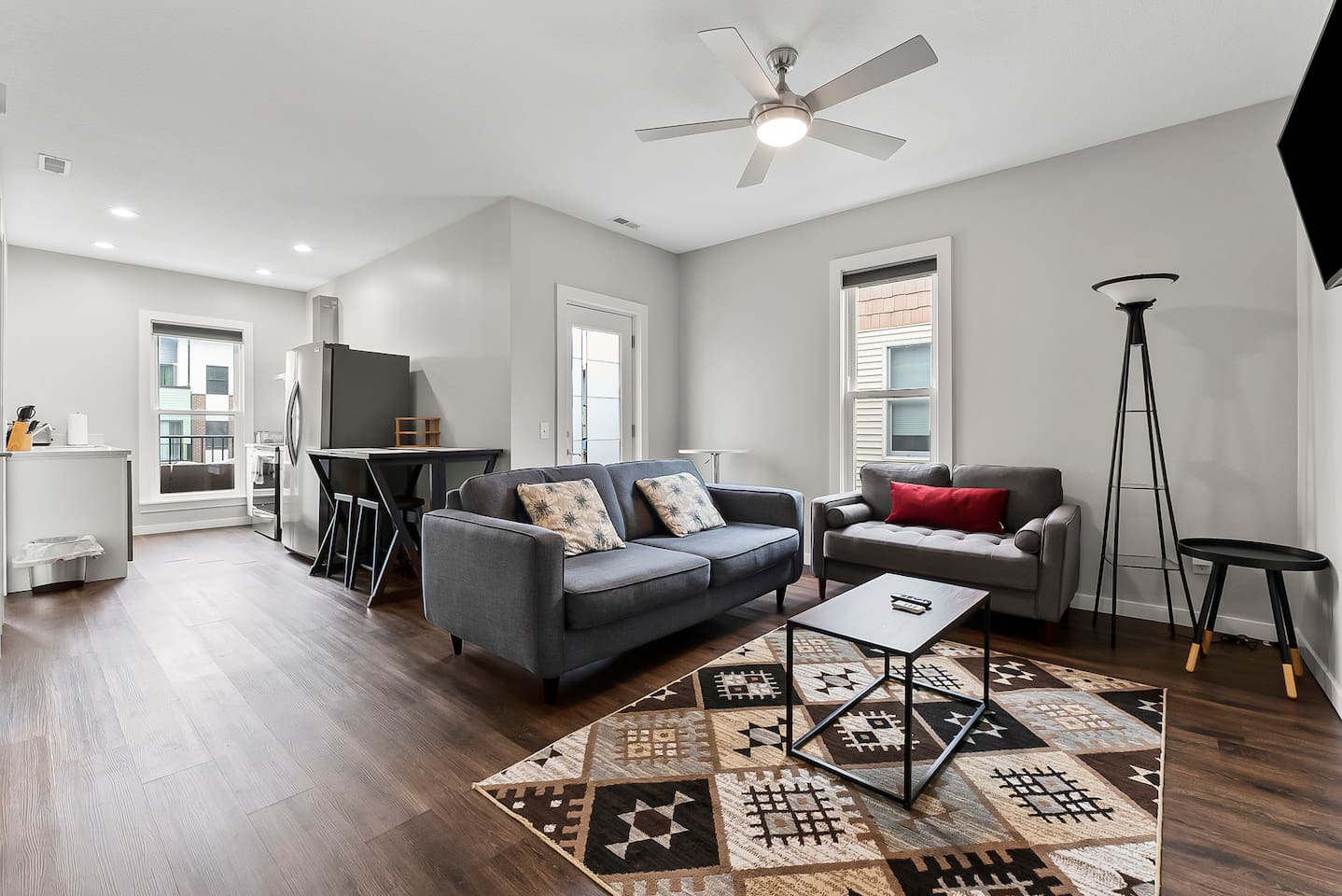 Open-concept design flows seamlessly from the living room into the kitchen and dining area.