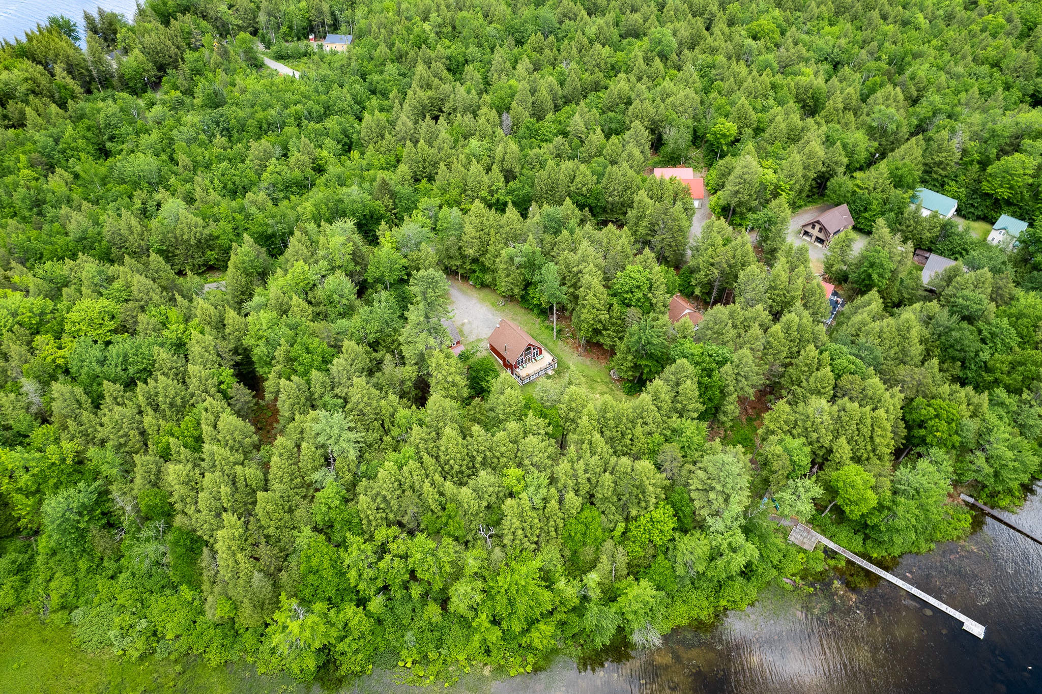 Aerial view of the house and the dock. Peaceful and quiet surroundings that are perfect to unplug and relax.