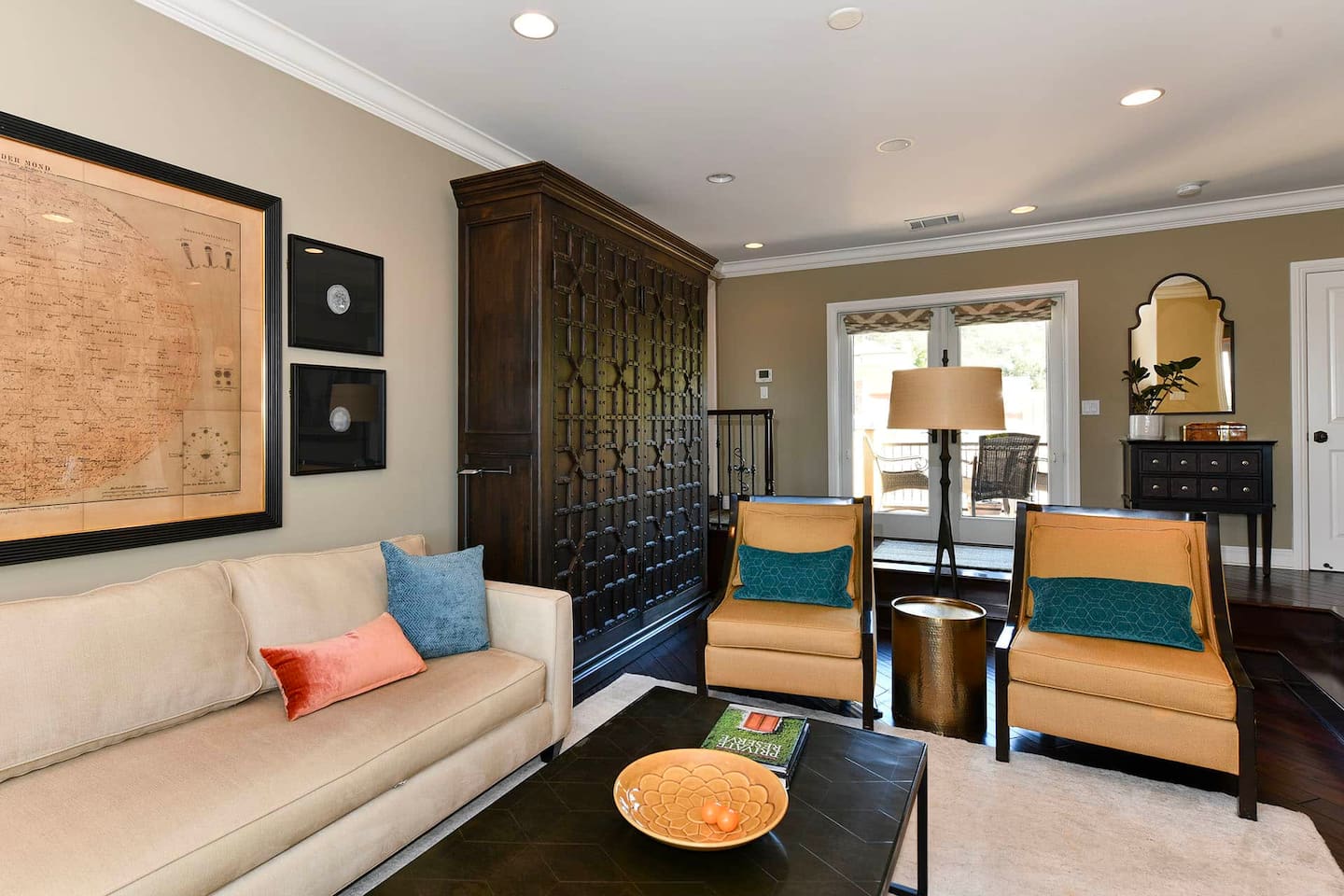 Living room with smart tv, off of garage entrance