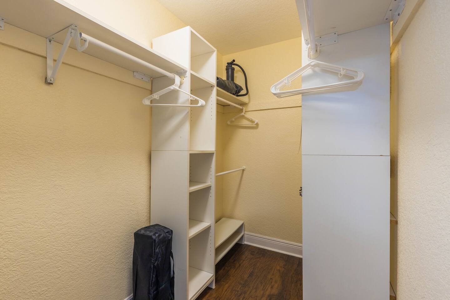 The 1st Bedroom has a King-sized bed, Smart App TV and large white dresser. It also has an en-suite bathroom with shower and new vanity. There is a great walk-in closet with a pack n play and sheets as well as inflatable mattress.