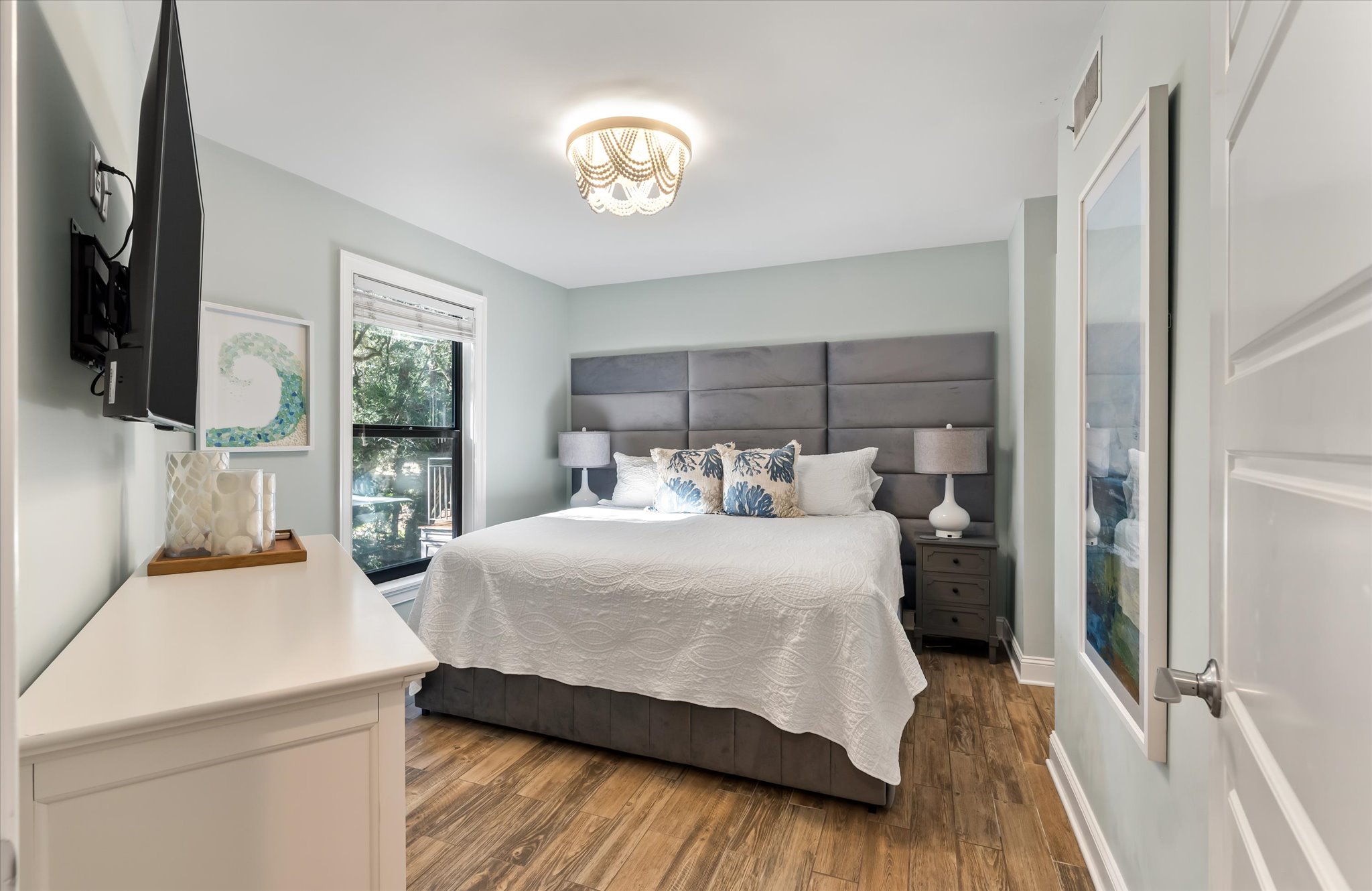 Primary suite with king bed and full bathroom