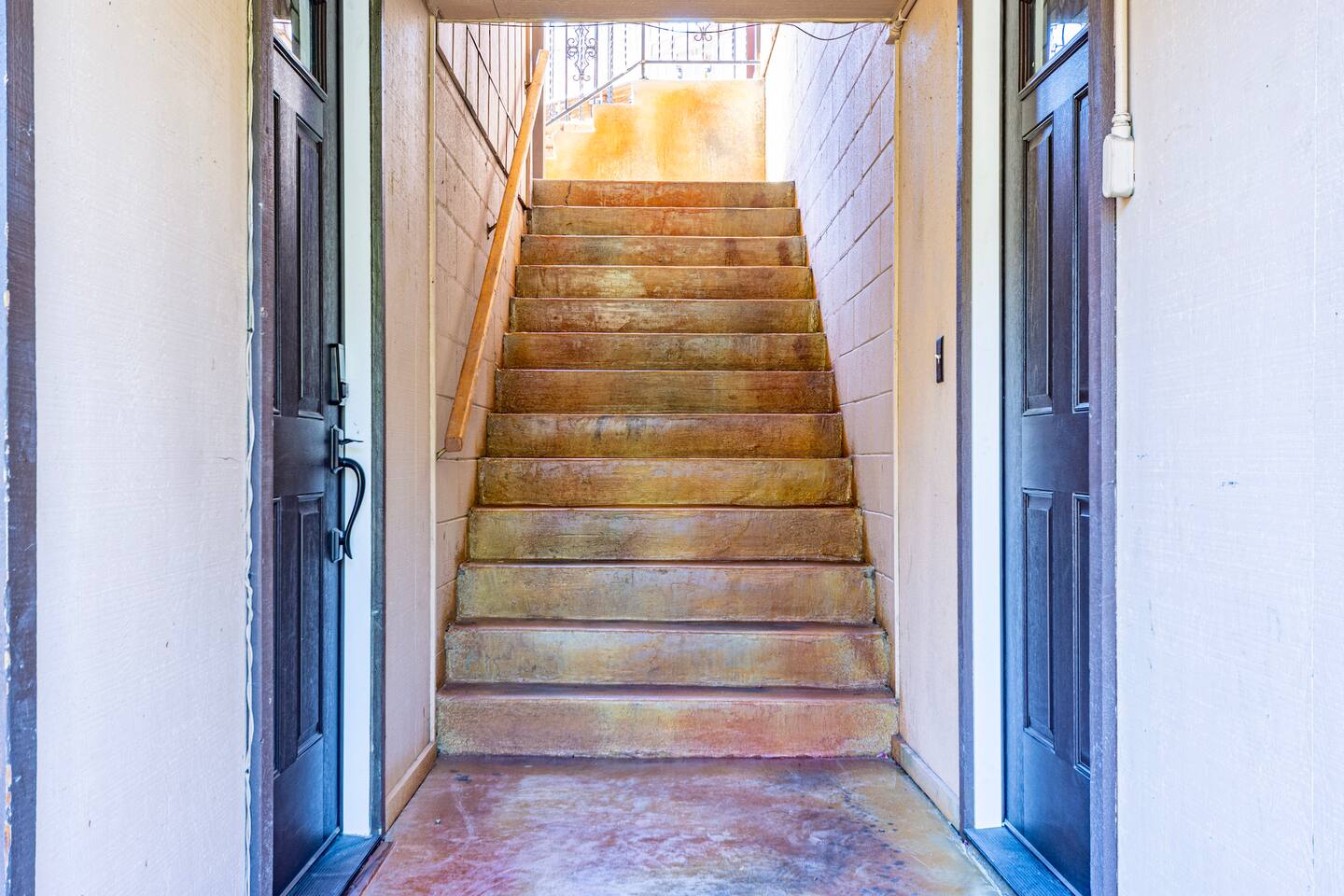 Stairs between two stores, no connection within the house