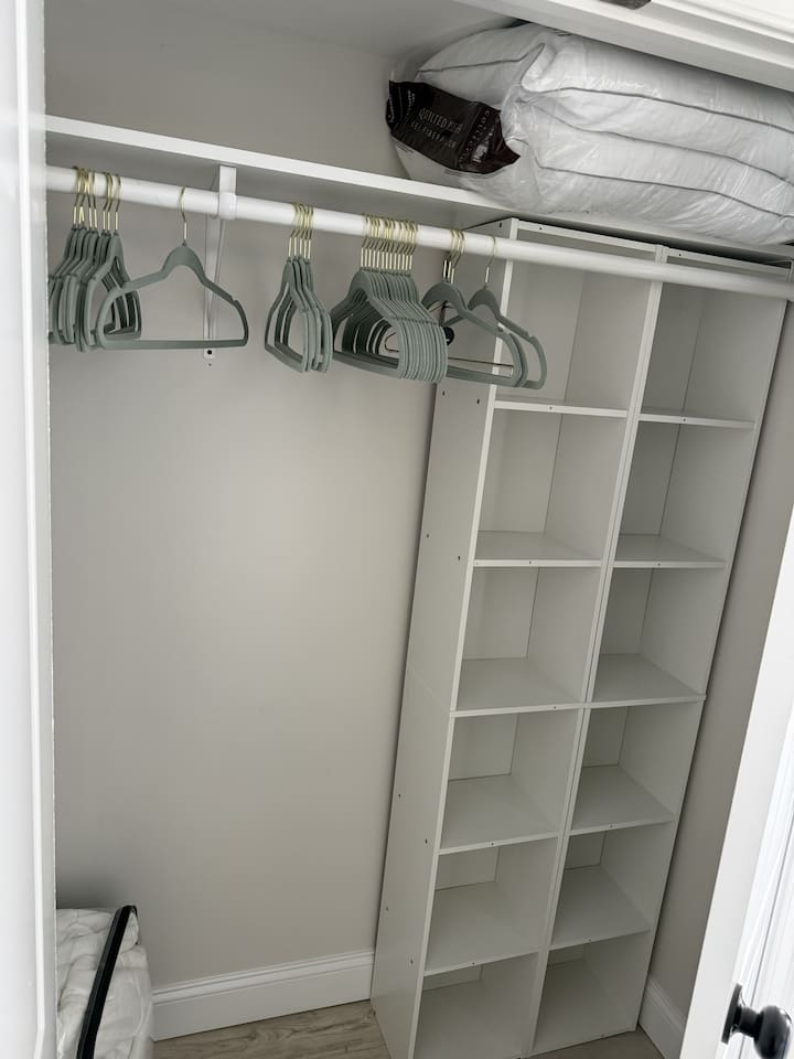 Full closet with storage space