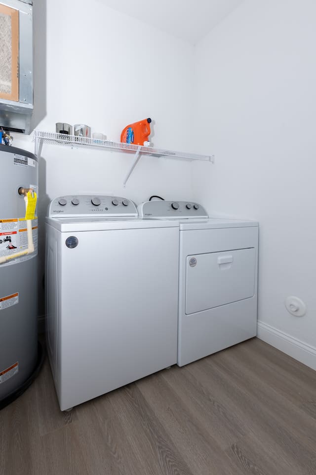 Laundry room has washer and dryer.