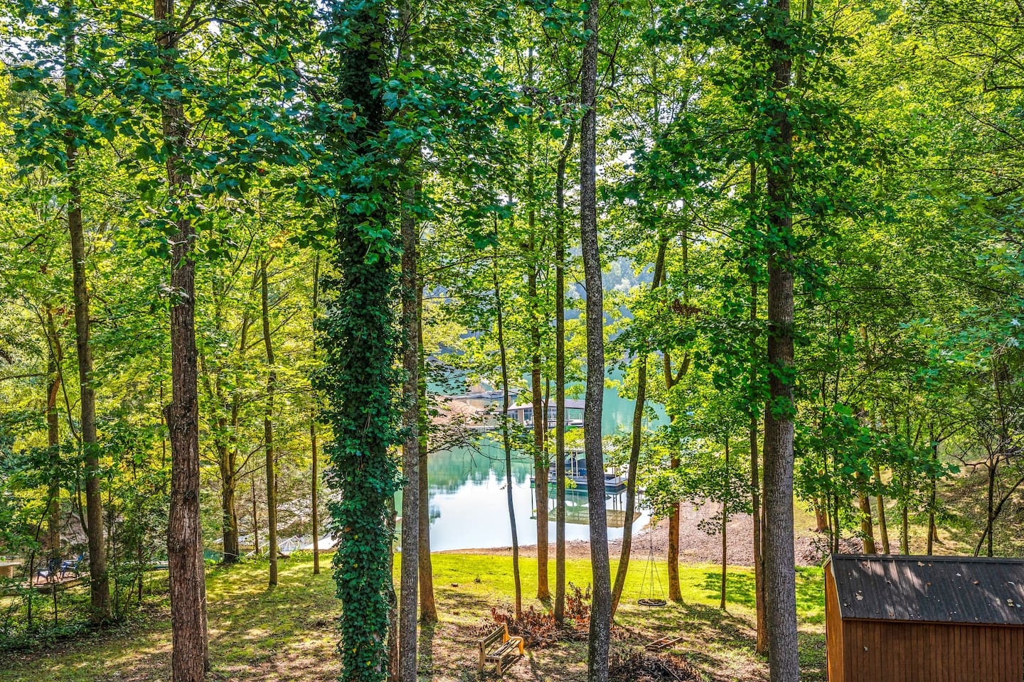 Exterior shot looking down to the lake from back porch