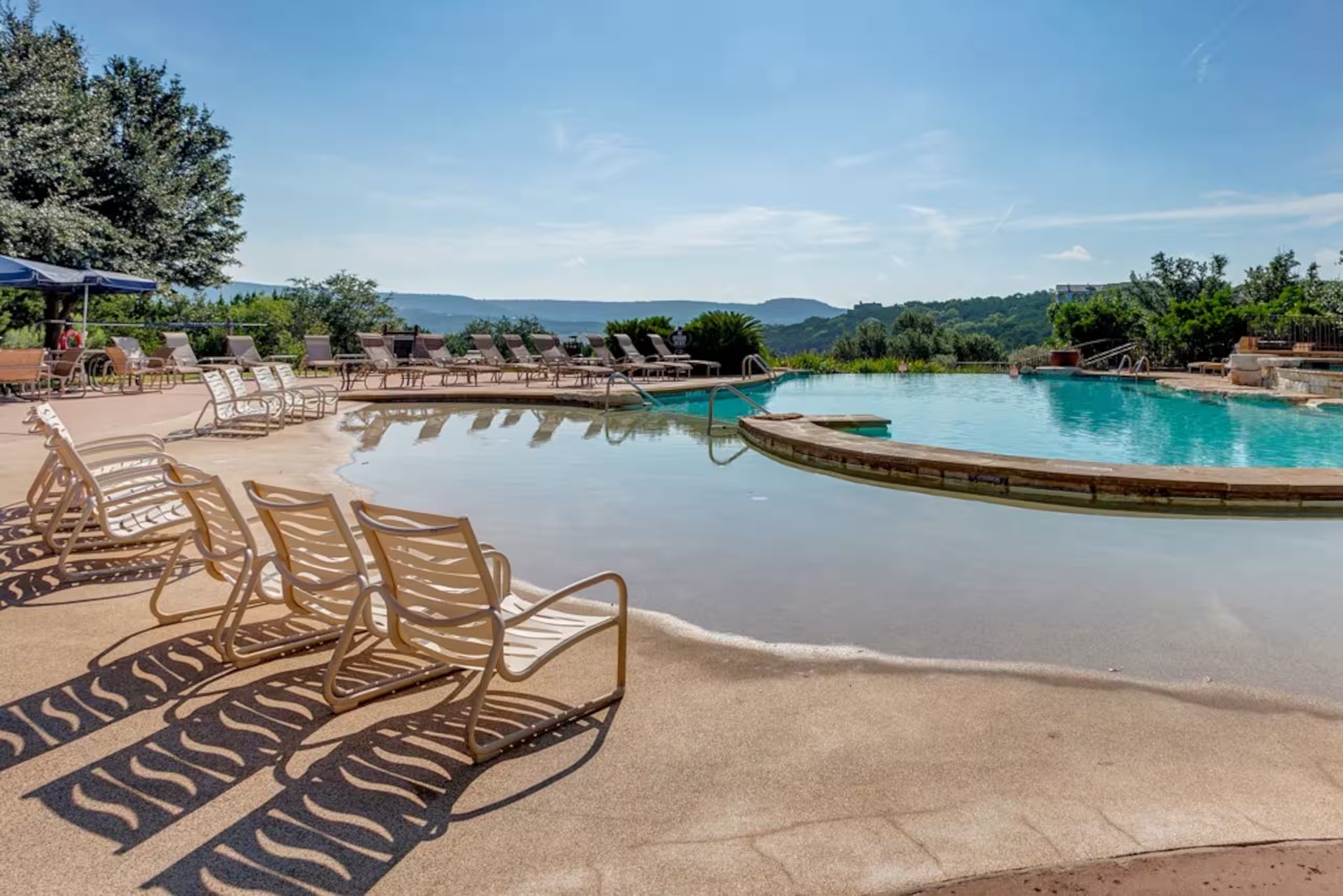 The Hollows Beach Club features three pools, an oversized hot tub, 